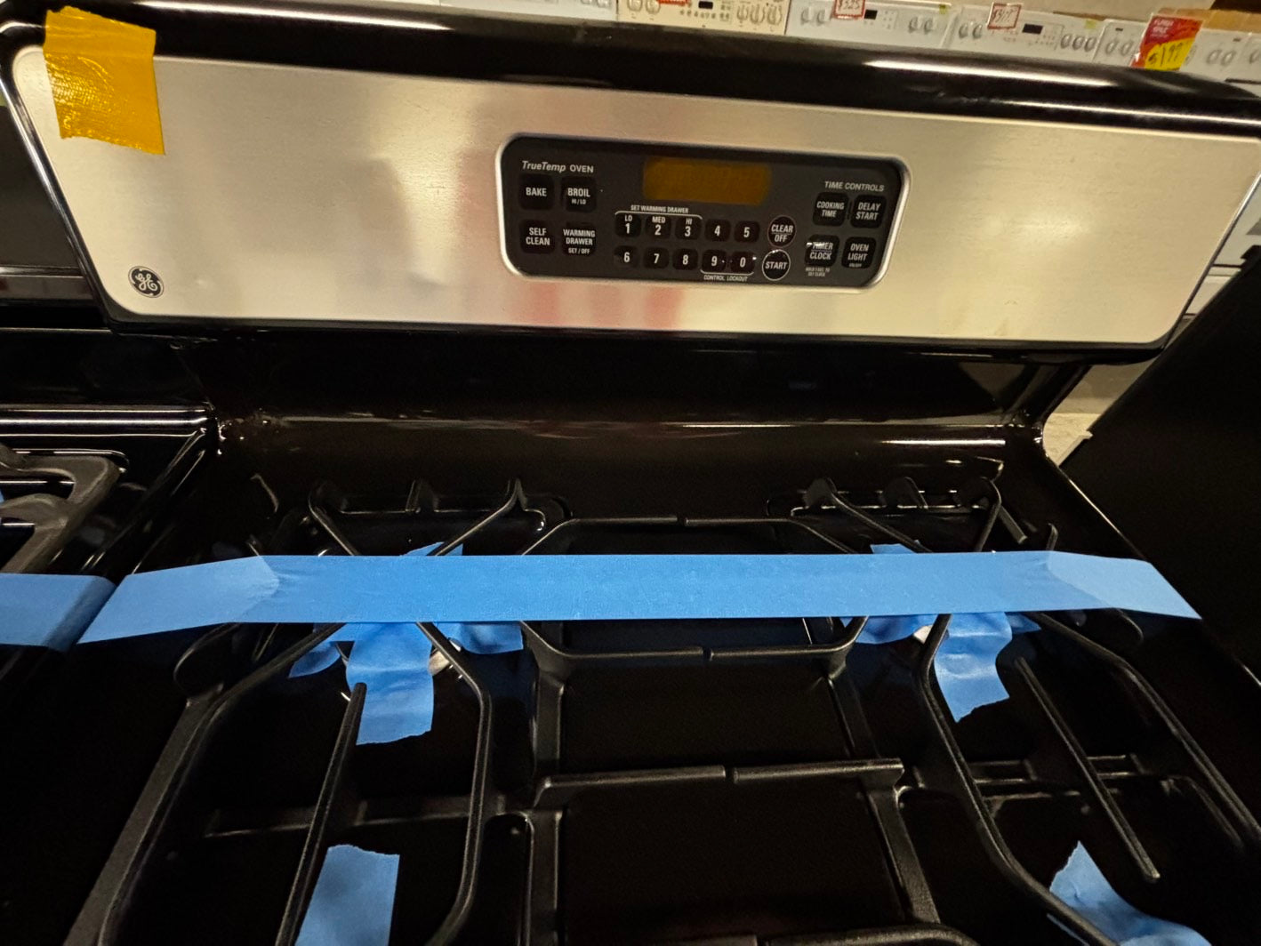 GE Gas range 4 burner bake broil hi/lo self clean in stainless steel & back used- Refurbished 30" #GRB43B