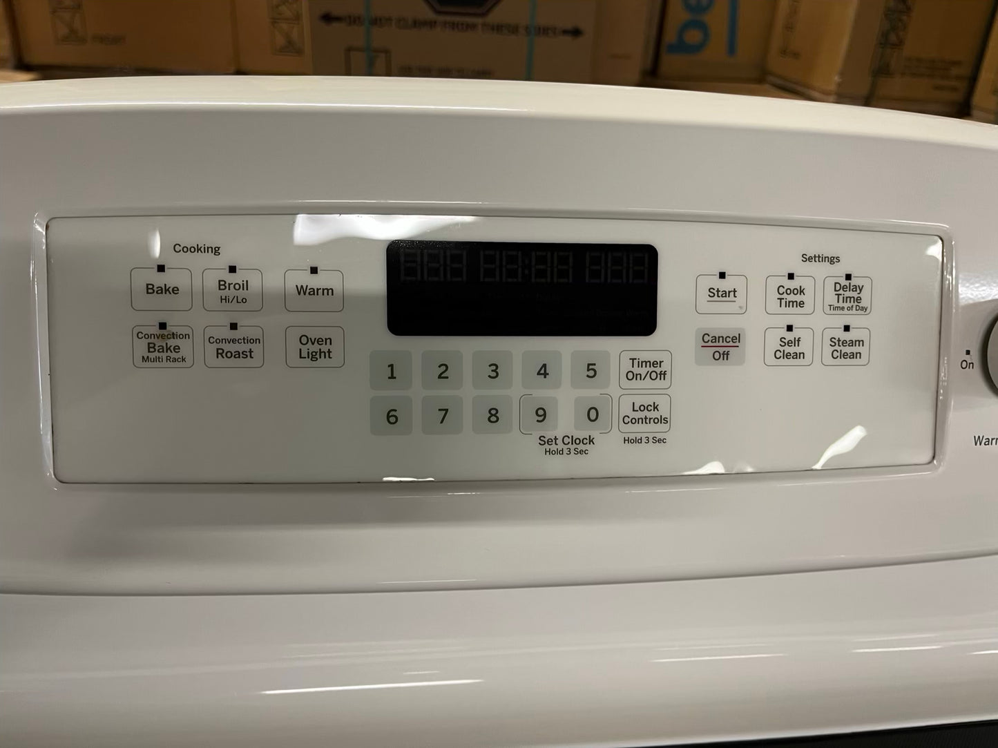GE electric range 220v 5 burner warm zone convection bake roast broil hi/lo steam clean in off white Refurbished 30" #ER179YB