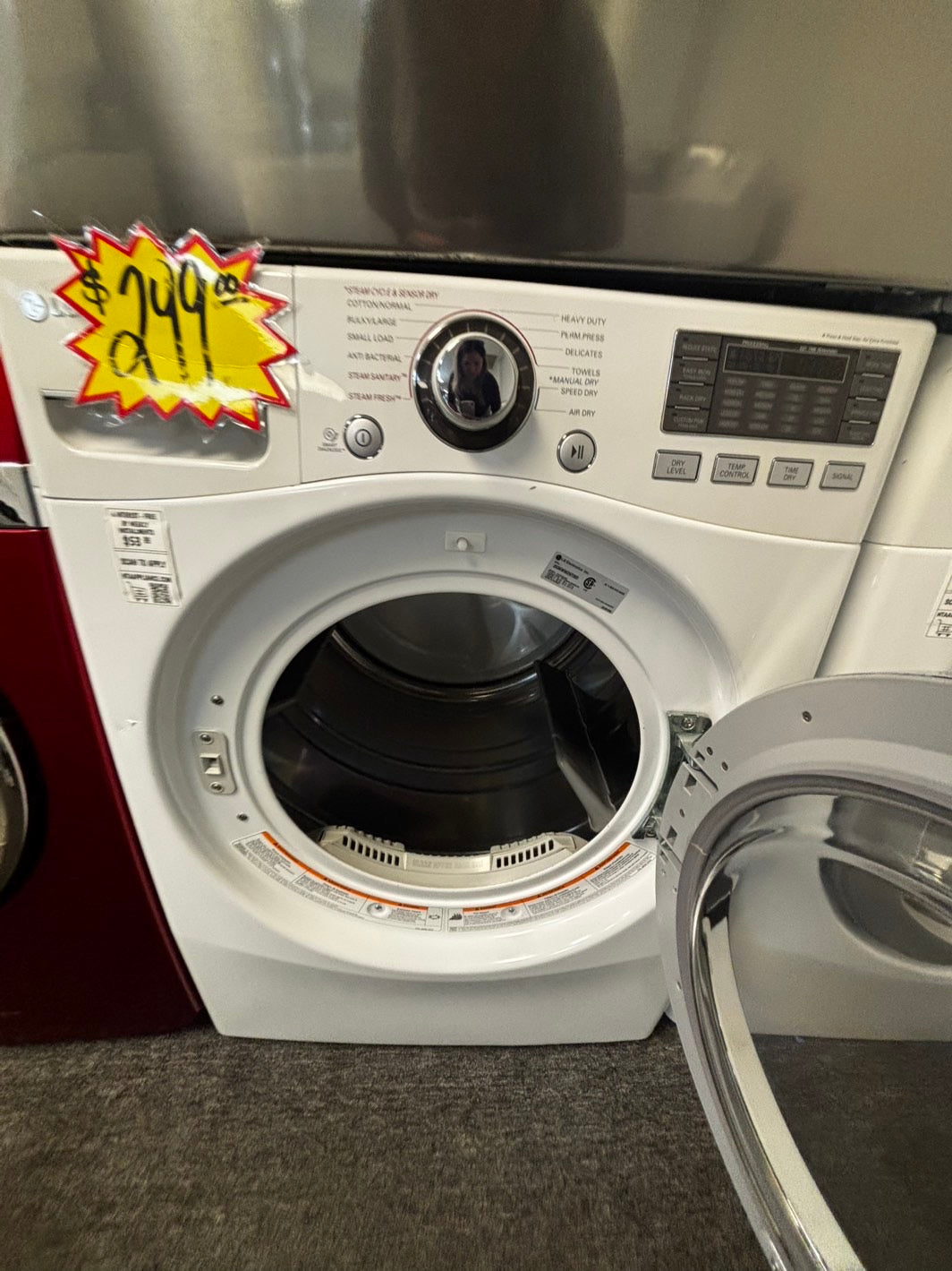 - used -refurbished LG 7.4cu.ft.steam sensor Dry 10 cicles 5 temperature settings -front load stackable or side by side electric 220v dryer in white 27" #EDL6688L