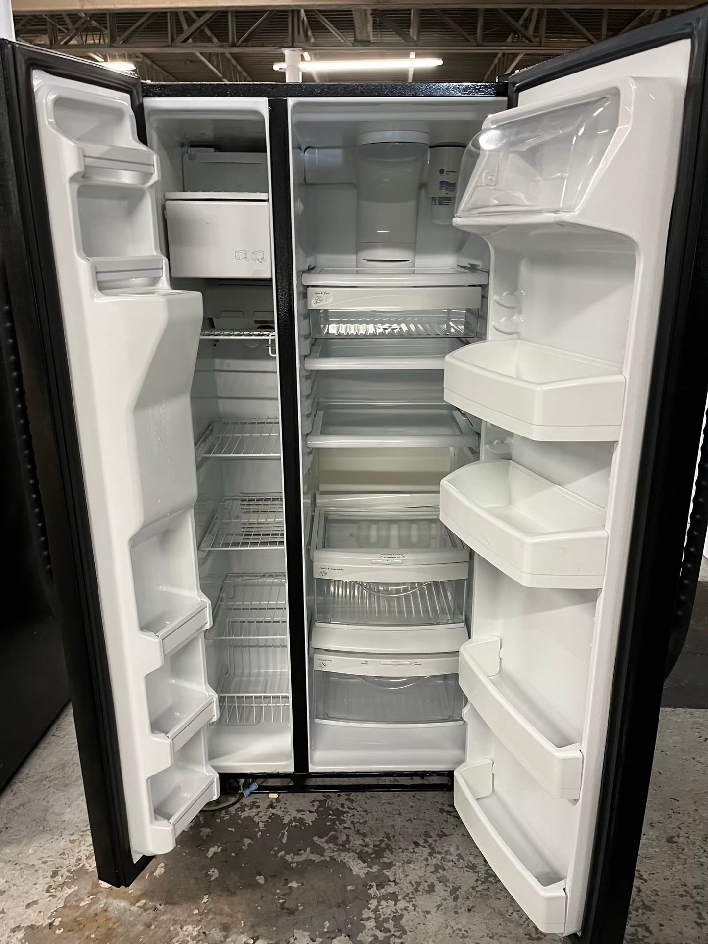 GE side x side refrigerator black w/ice water dispenser 33” #RF393VB