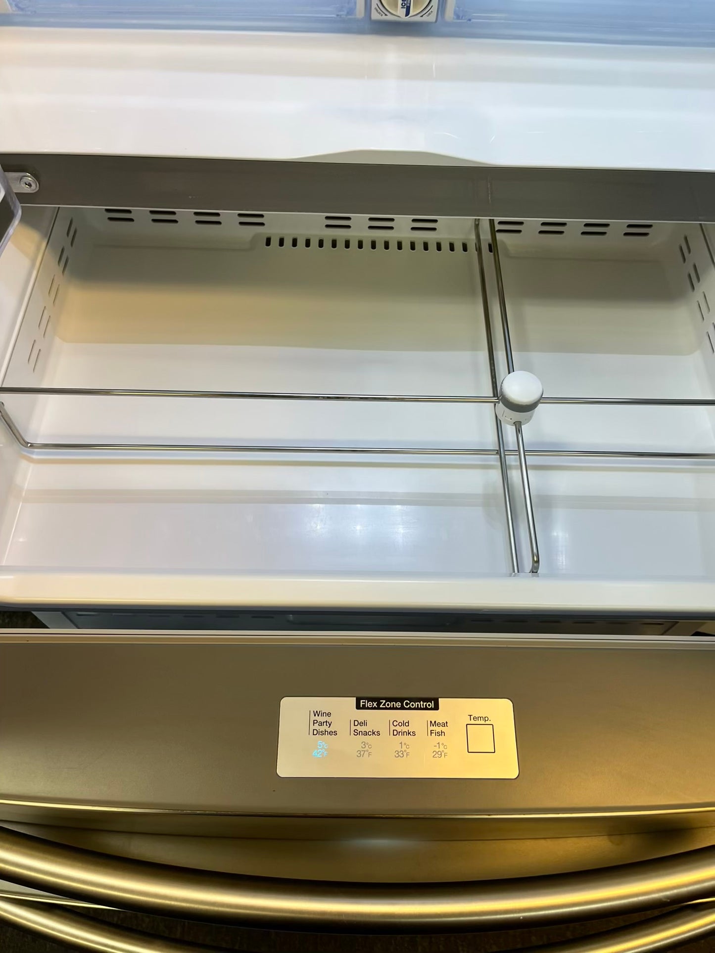 Used | Refurbished Samsung four door refrigerator stainless steel w/ice water dispenser 36" #RF502YL