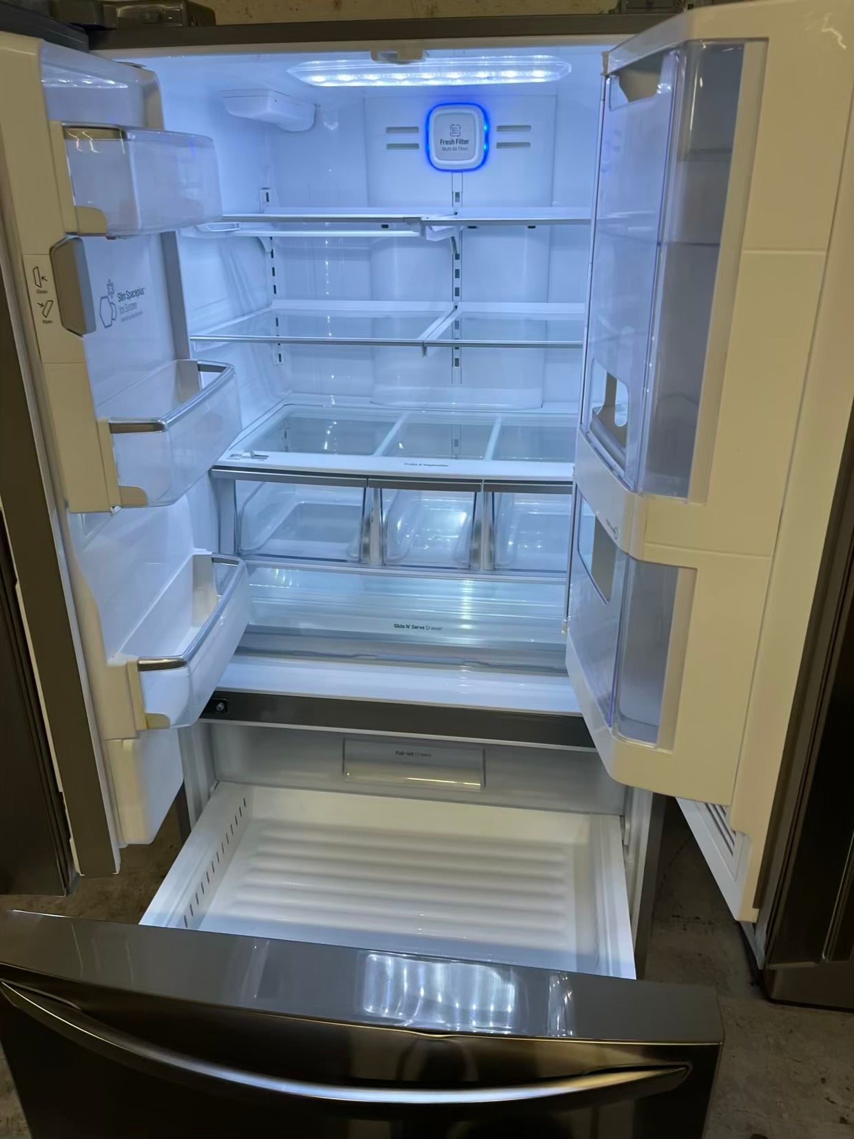 LG French door refrigerator Showcase stainless steel w/ice water dispenser 36" Refurbished #RF735SB