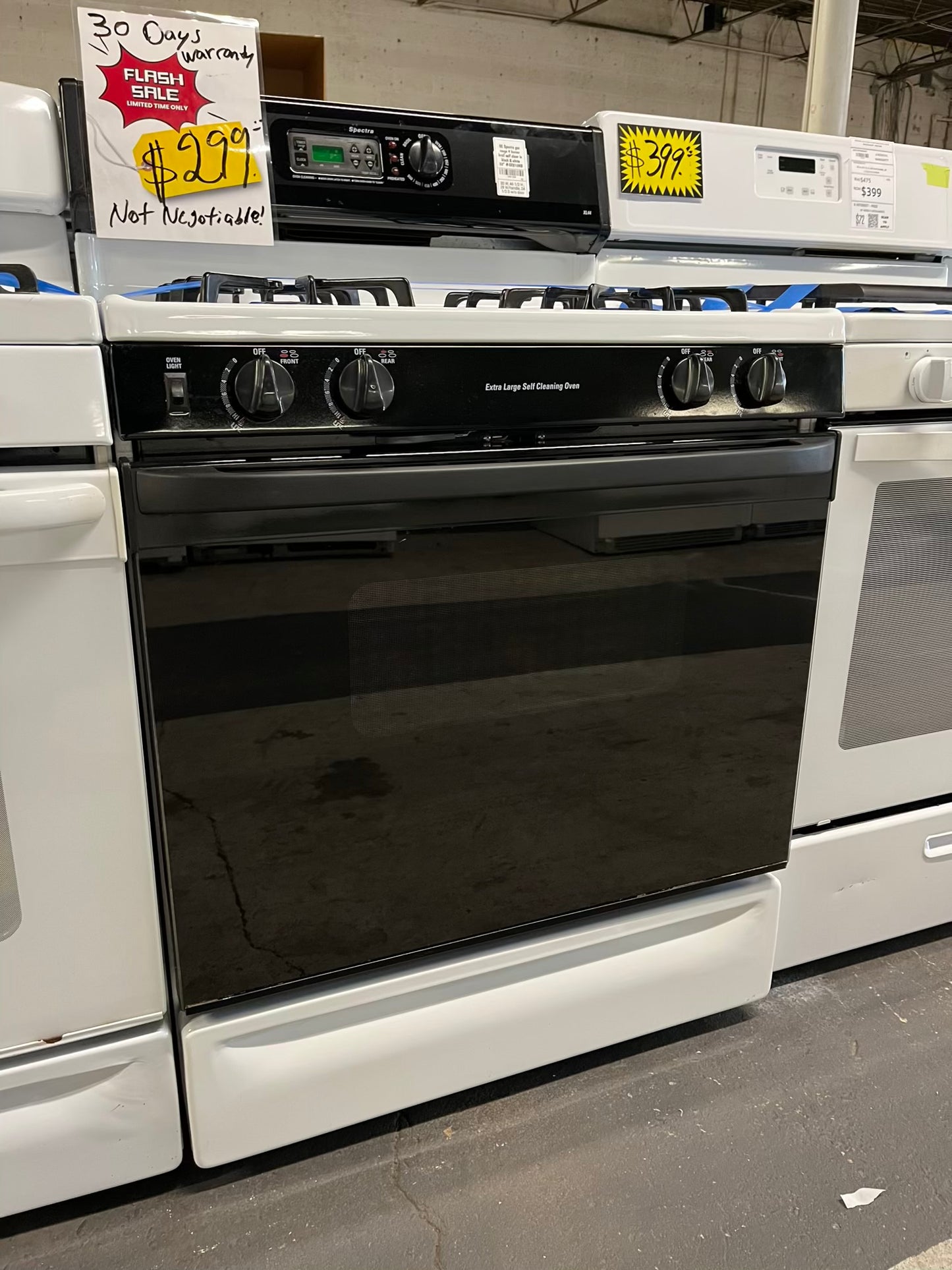 GE Spectra gas range 4 burner broil self clean in black & white 30" #CR810NB