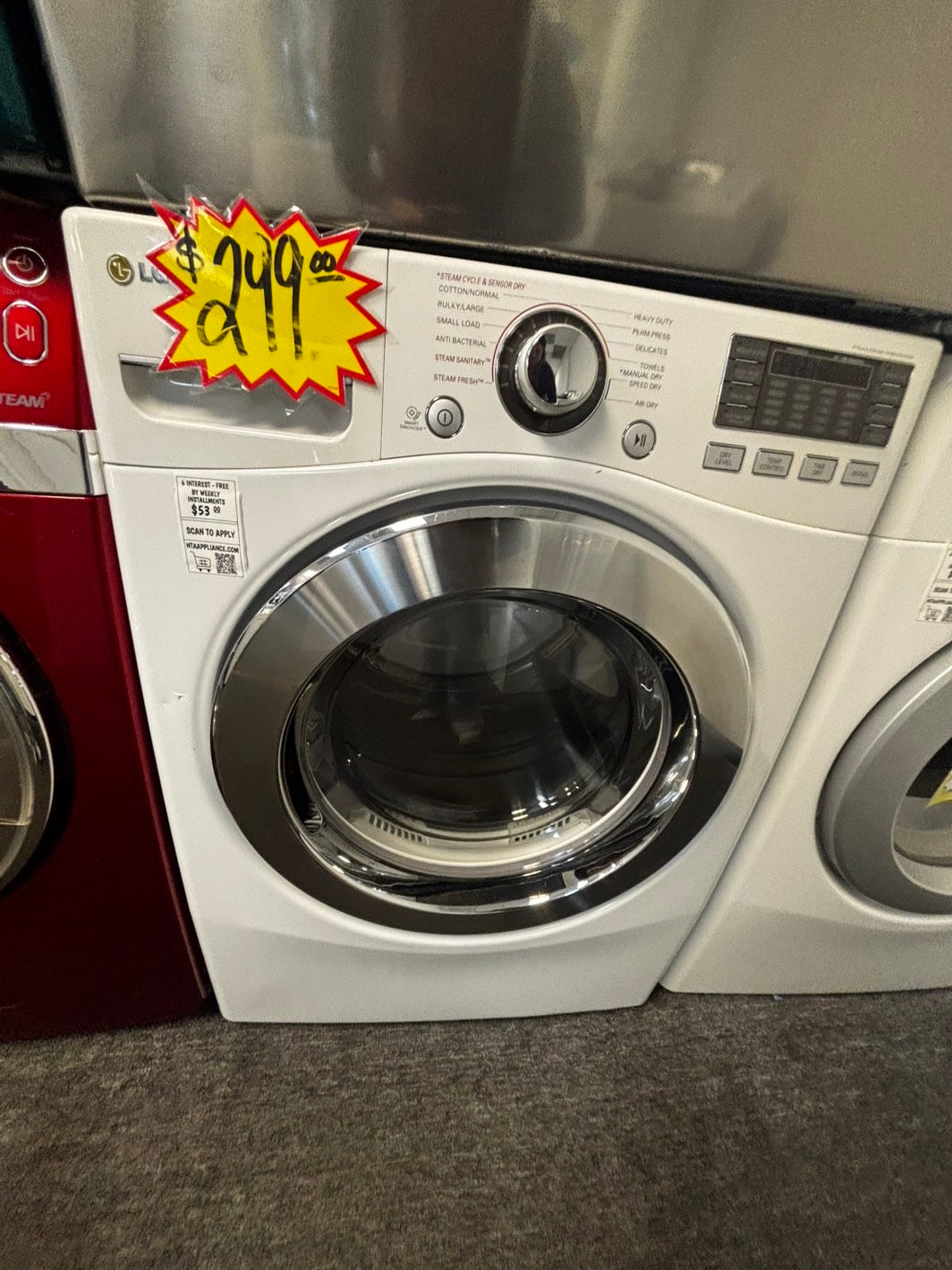 - used -refurbished LG 7.4cu.ft.steam sensor Dry 10 cicles 5 temperature settings -front load stackable or side by side electric 220v dryer in white 27" #EDL6688L