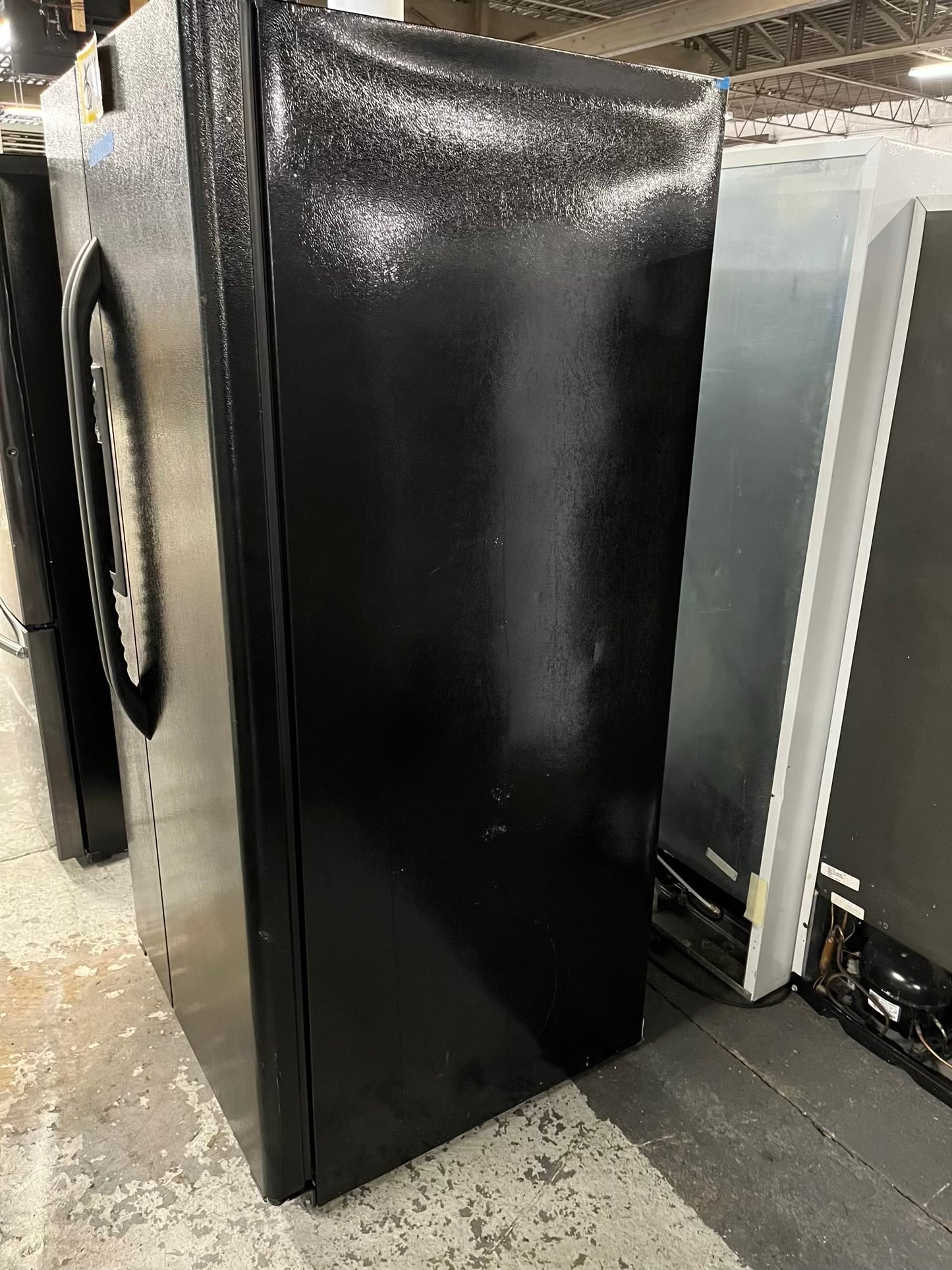 GE side x side refrigerator black w/ice water dispenser 33” #RF393VB