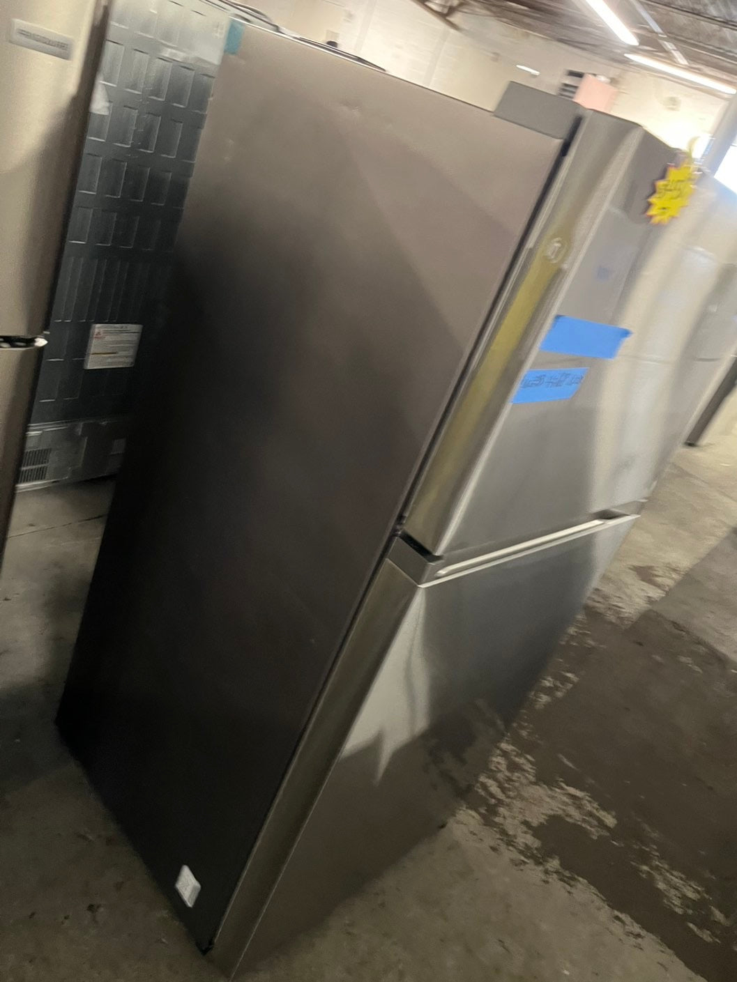 =Samsung 33”top freezer refrigerator Stainless steel-used -refurbished 33" item number #RFSMA14B
