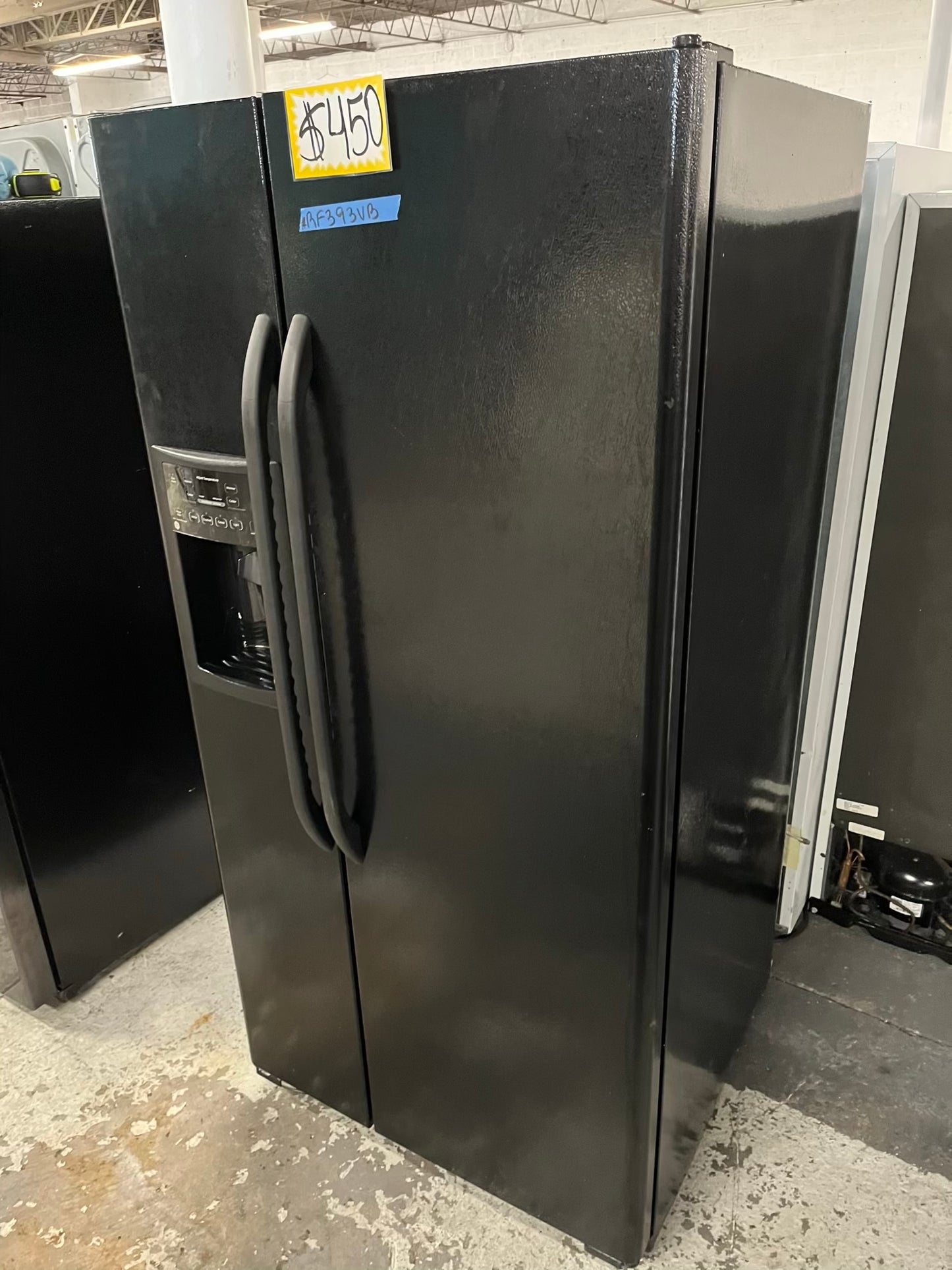 GE side x side refrigerator black w/ice water dispenser 33” #RF393VB