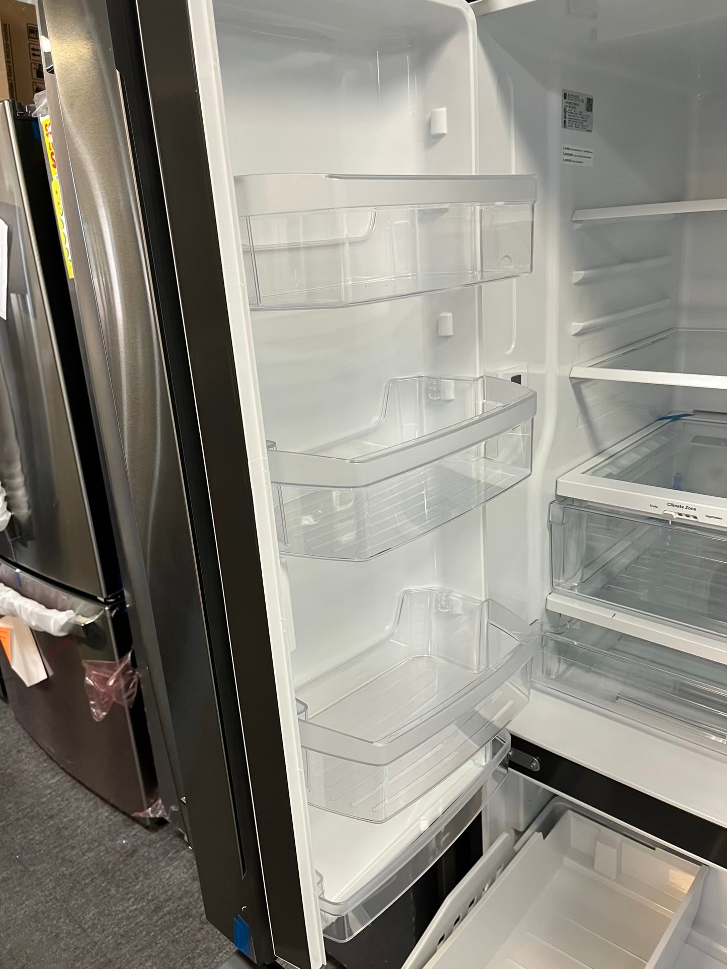 Customer Return | Scratch & Dent GE French door refrigerator stainless steel w/ice & water dispenser inside 36" #RF492GL