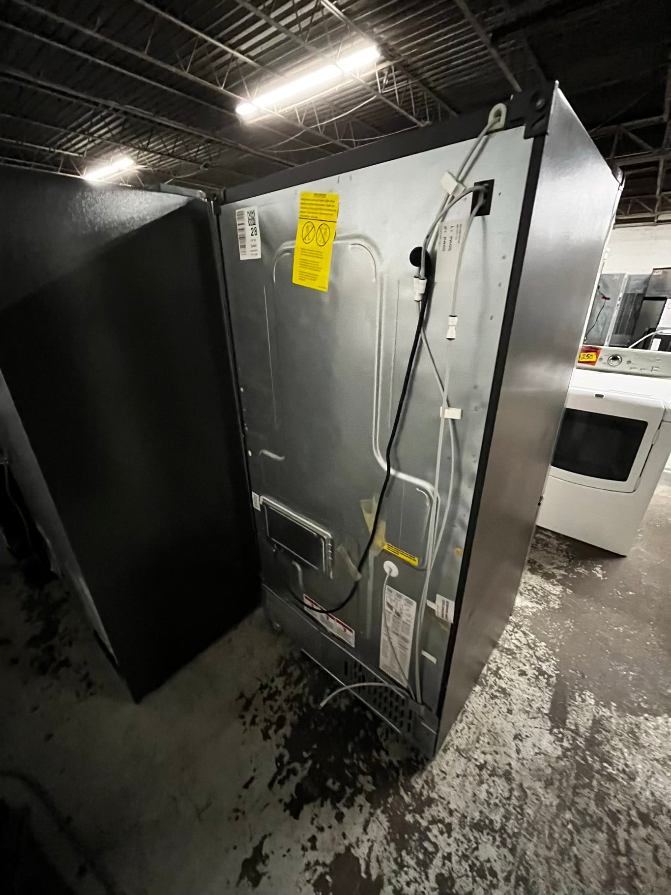 *Used | Refurbished GE 28cu.ft. French door refrigerator stainless steel w/ice water dispenser 36" stock number #RF2437AB