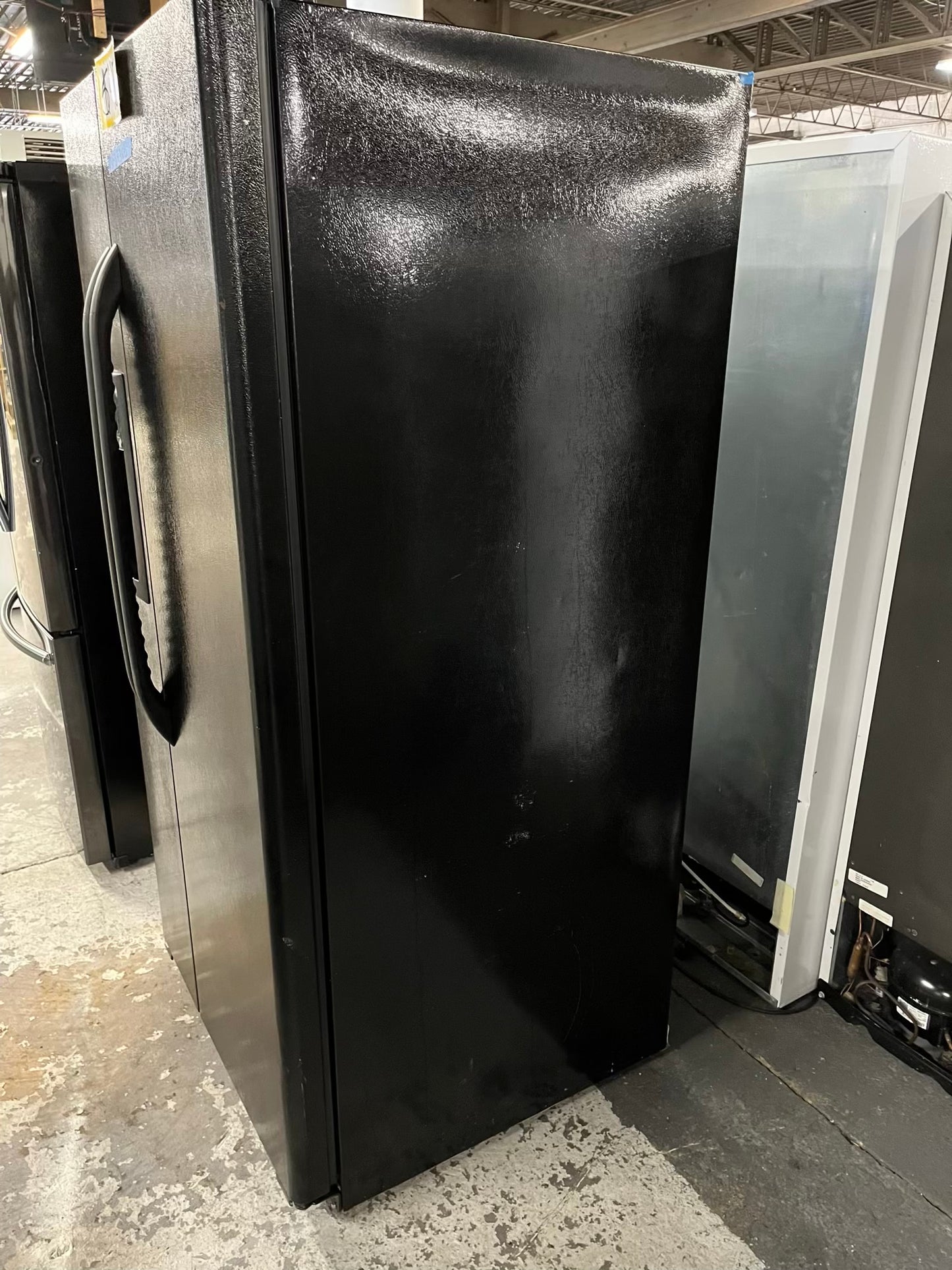 GE side x side refrigerator black w/ice water dispenser 33” #RF393VB