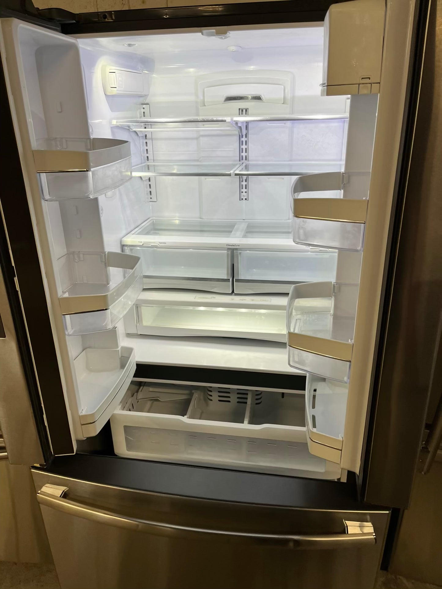 GE French door Refrigerator counter depth stainless steel w/water dispenser  & ice maker inside Item number #RF734VB 36” in Refurbished