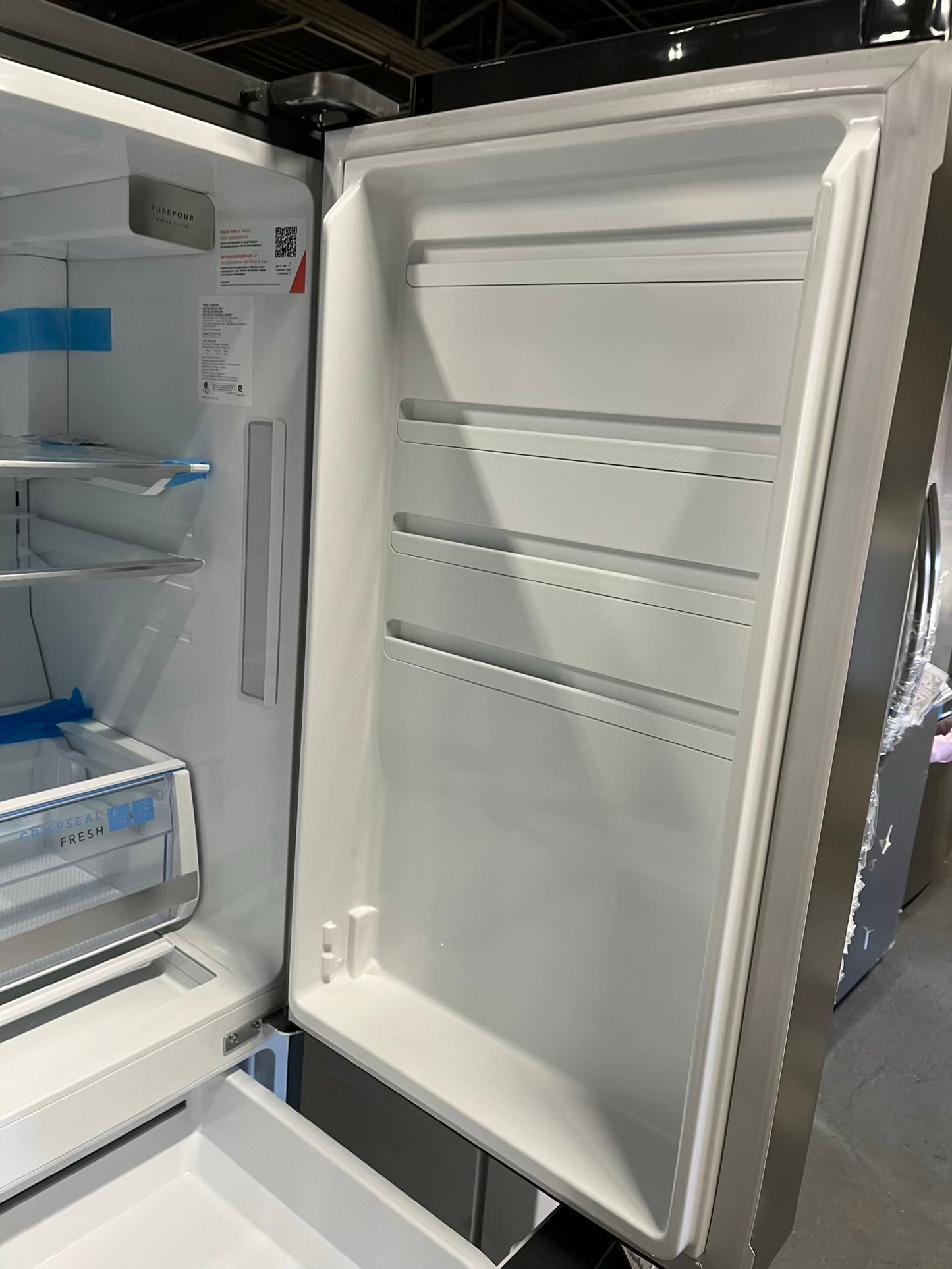- Frigidaire Gallery four door refrigerator counter depth  stainless steel w/ice and water dispenser  used-refurbished 36”  #RF994BPB