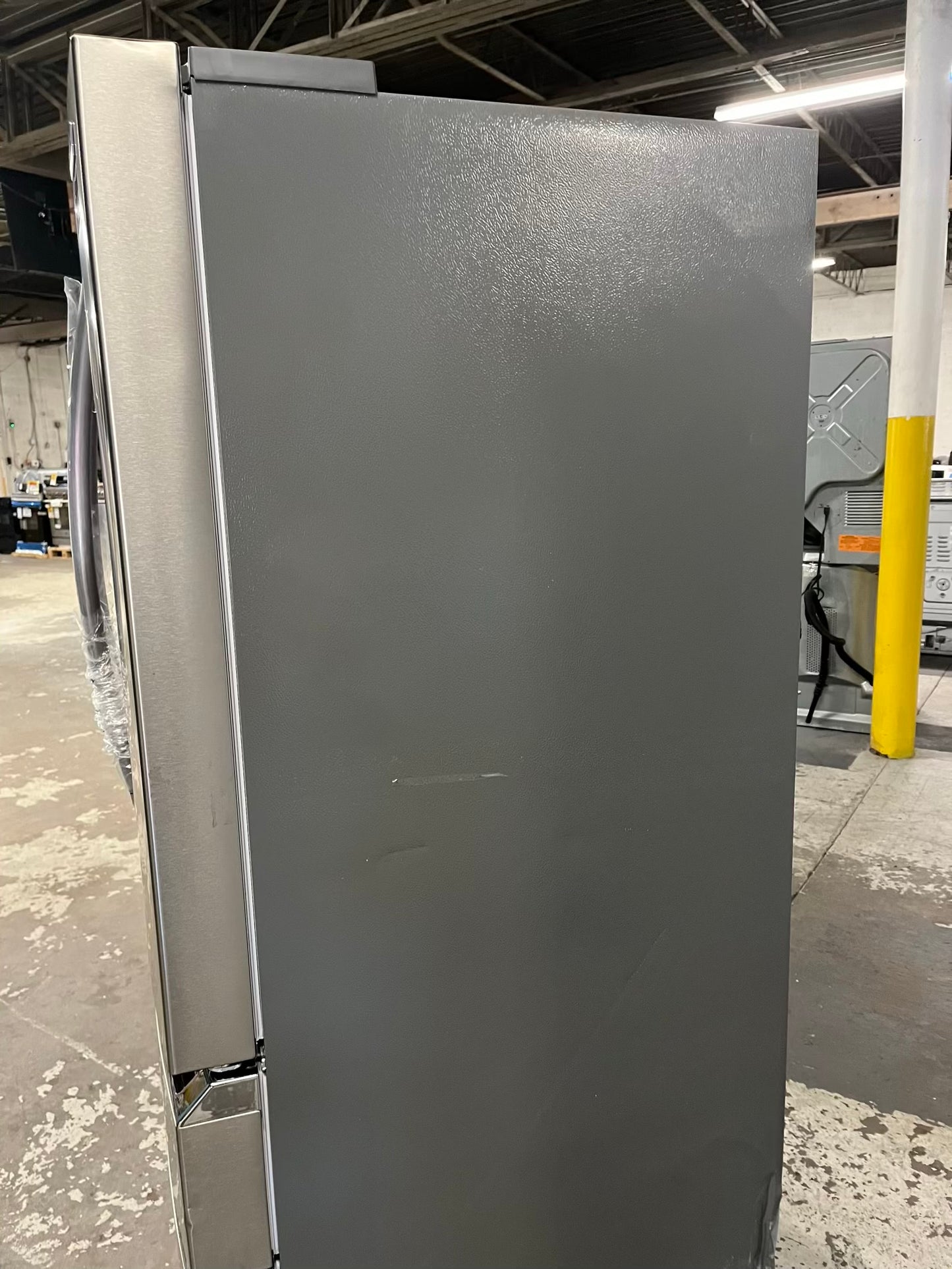 - Frigidaire Gallery four door refrigerator counter depth  stainless steel w/ice and water dispenser  used-refurbished 36”  #RF994BPB