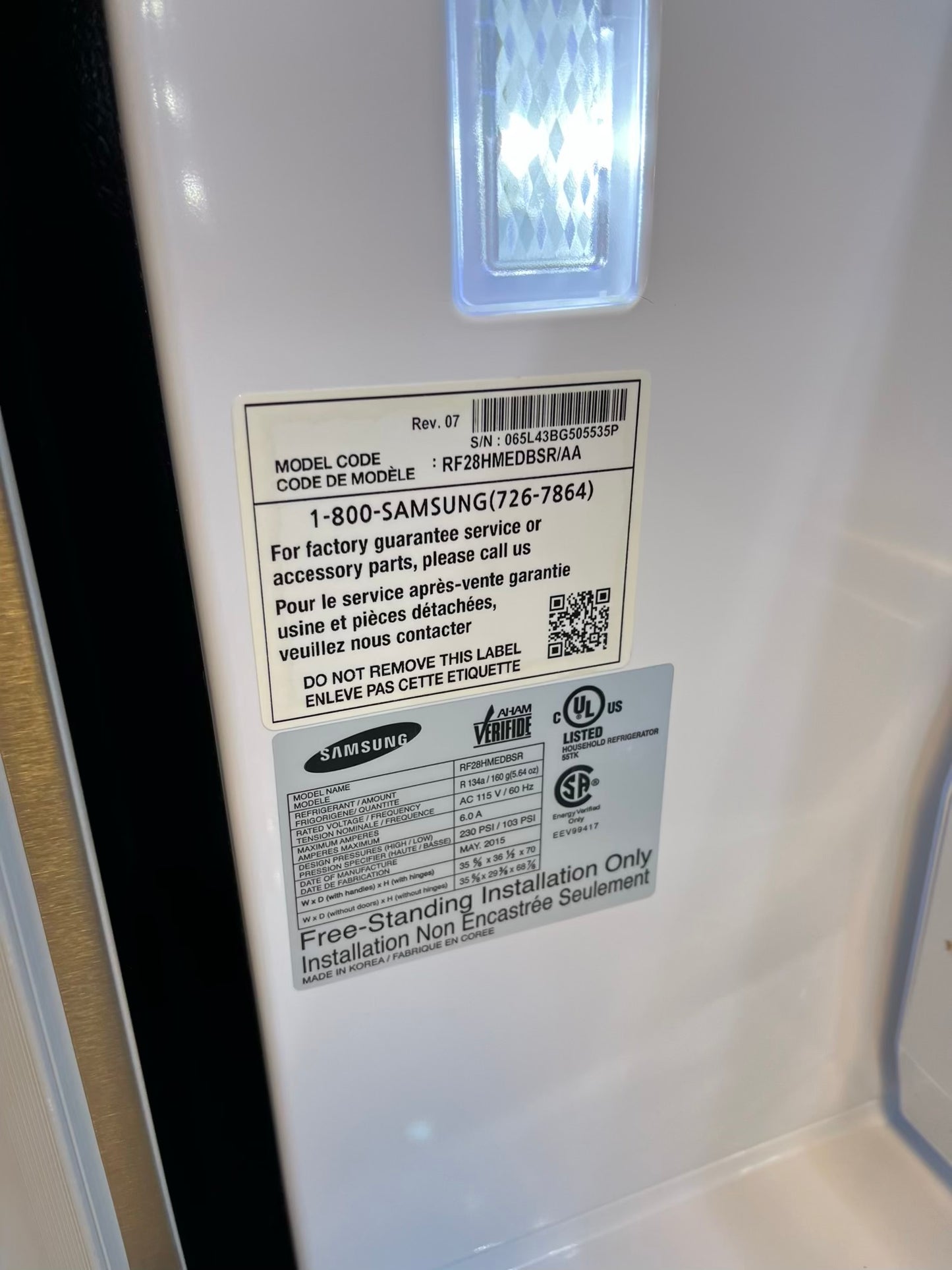 Used | Refurbished Samsung four door refrigerator stainless steel w/ice water dispenser 36" #RF502YL
