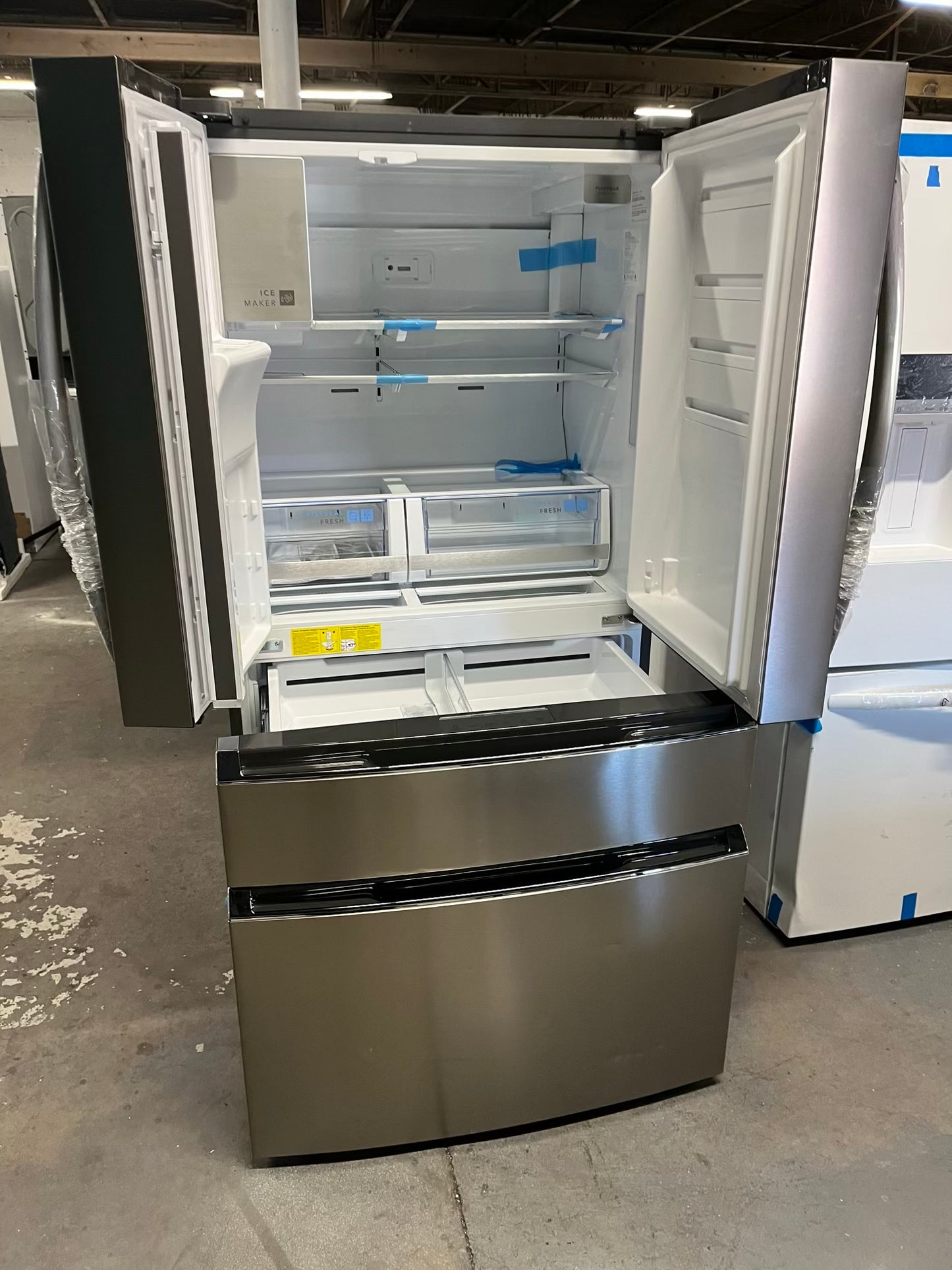 - Frigidaire Gallery four door refrigerator counter depth  stainless steel w/ice and water dispenser  used-refurbished 36”  #RF994BPB