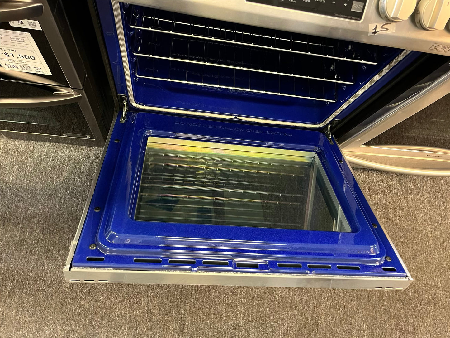 Open Box 6.3 cu. ft. Smart wi-fi Enabled Dual Fuel Slide-in Range with ProBake Convection® and EasyClean® combines a gas cooktop with an electric 220v oven #GR296DL
