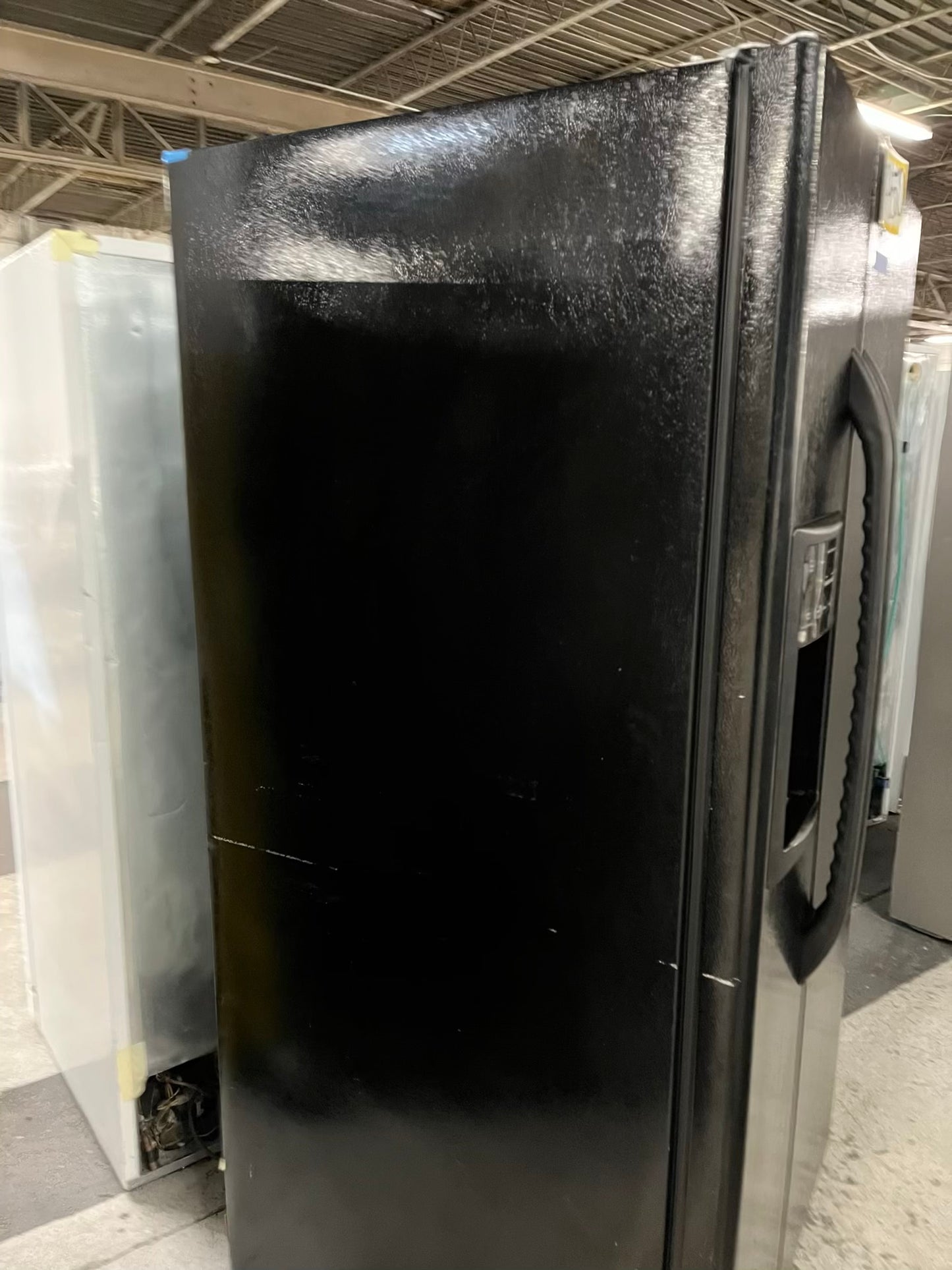 GE side x side refrigerator black w/ice water dispenser 33” #RF393VB