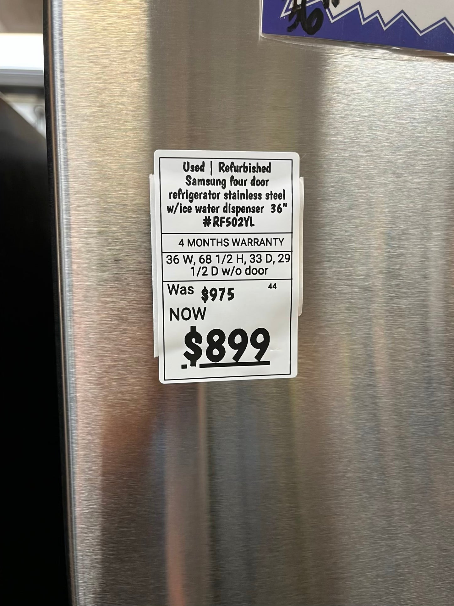 Used | Refurbished Samsung four door refrigerator stainless steel w/ice water dispenser 36" #RF502YL