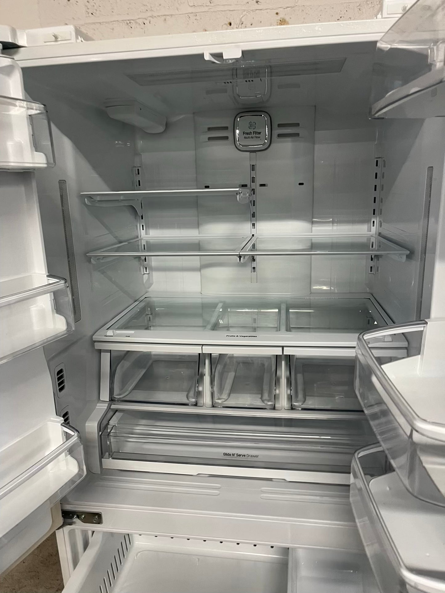 - LG French door Refrigerator in white w/ ice water dispenser 36" #RF518BB