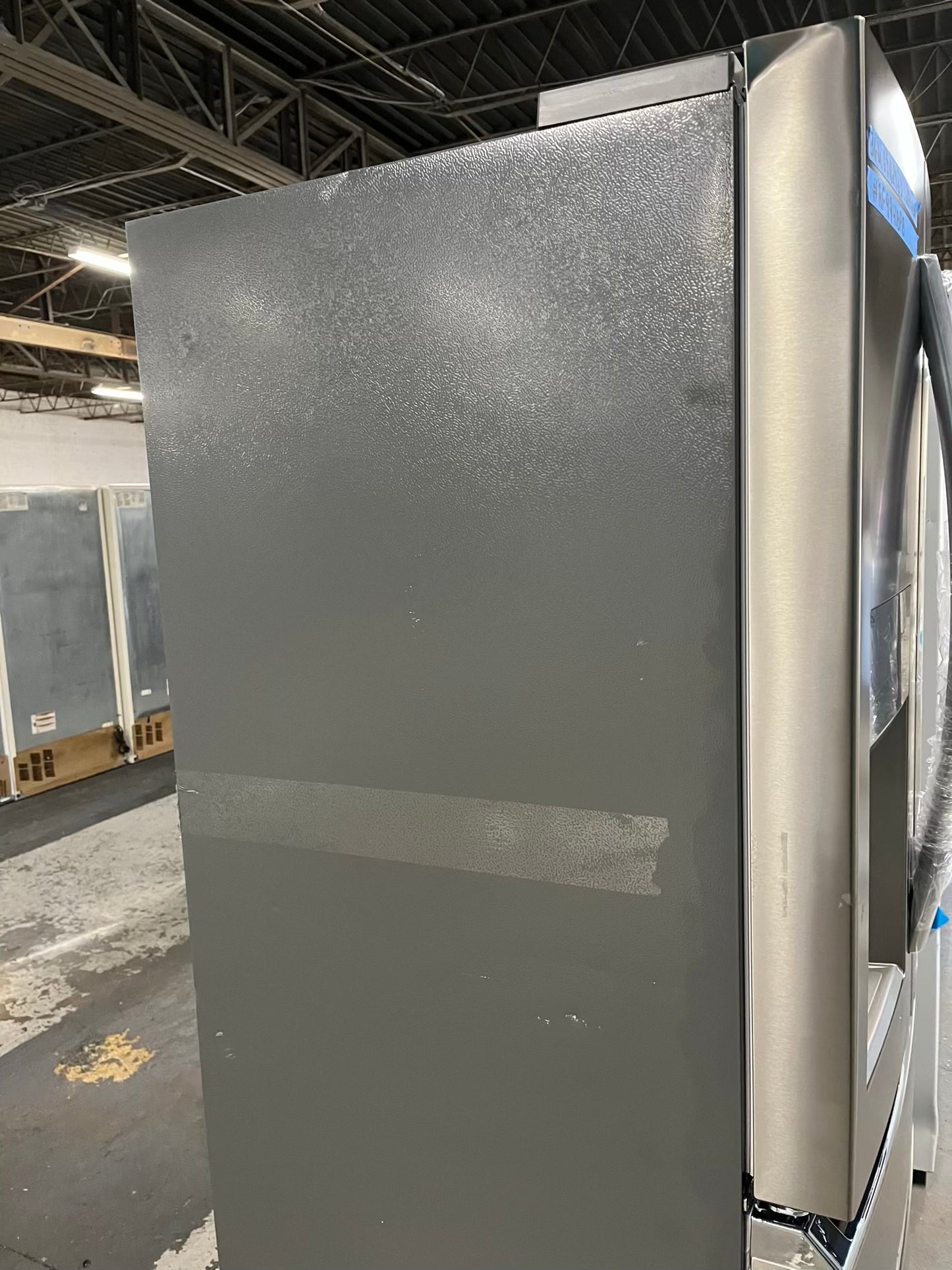 - Frigidaire Gallery four door refrigerator counter depth  stainless steel w/ice and water dispenser  used-refurbished 36”  #RF994BPB
