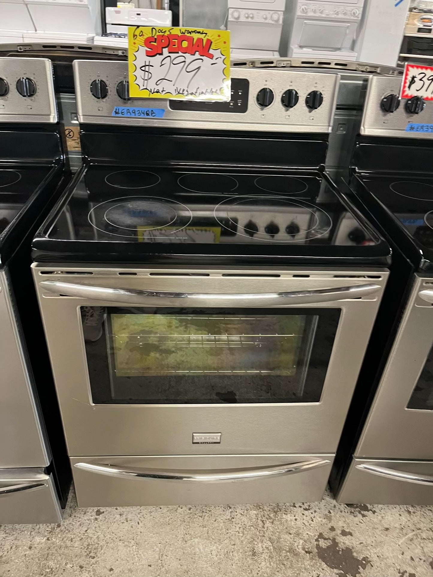 Frigidaire Gallery electric range stainless steel 5 burner warm zone bake broil self clean 30” item number #ER934KB