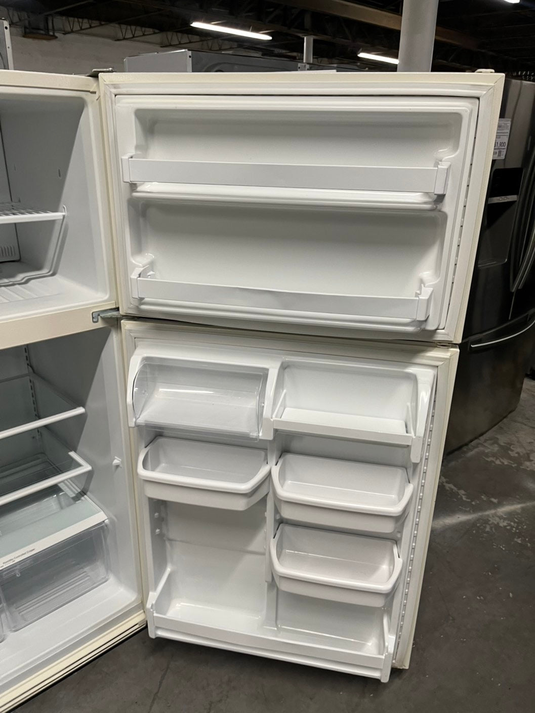 - Whirlpool 33” wide 21 Cu.Ft w/Iced Maker Top freezer refrigerator in bisque color 33" #RF21CT2B Refurbished