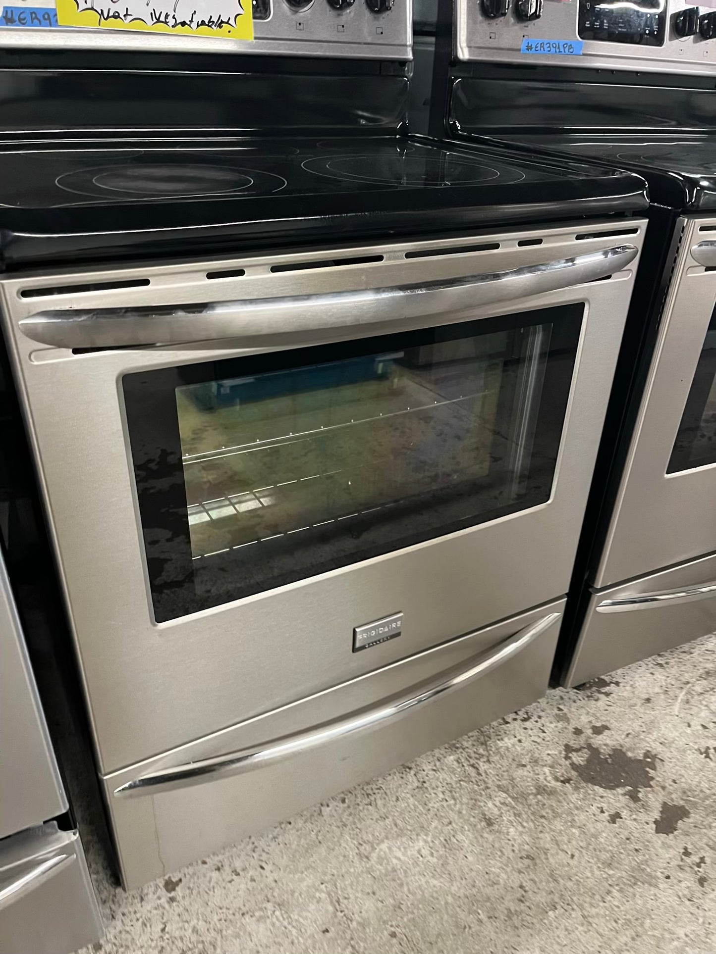 Frigidaire Gallery electric range stainless steel 5 burner warm zone bake broil self clean 30” item number #ER934KB