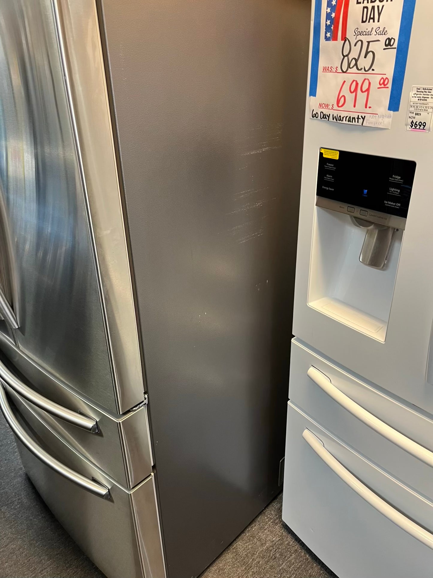 Used | Refurbished Samsung four door refrigerator stainless steel w/ice water dispenser 36" #RF502YL
