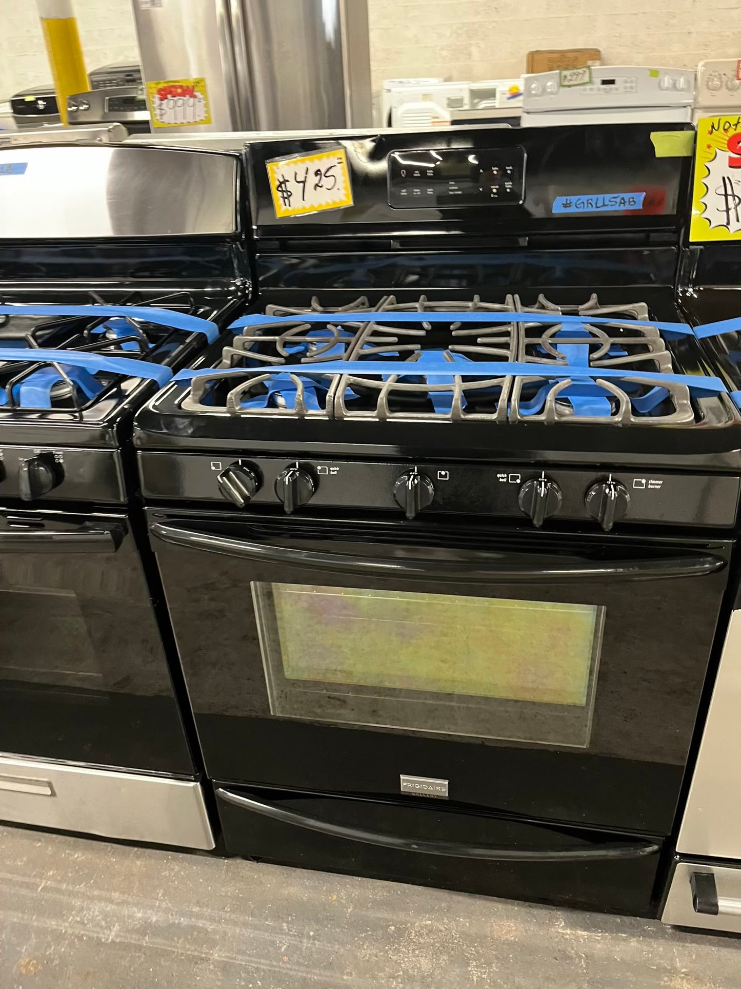 - Frigidaire GAS range black 5 burner bake broil self clean 30” item number #GR115AB