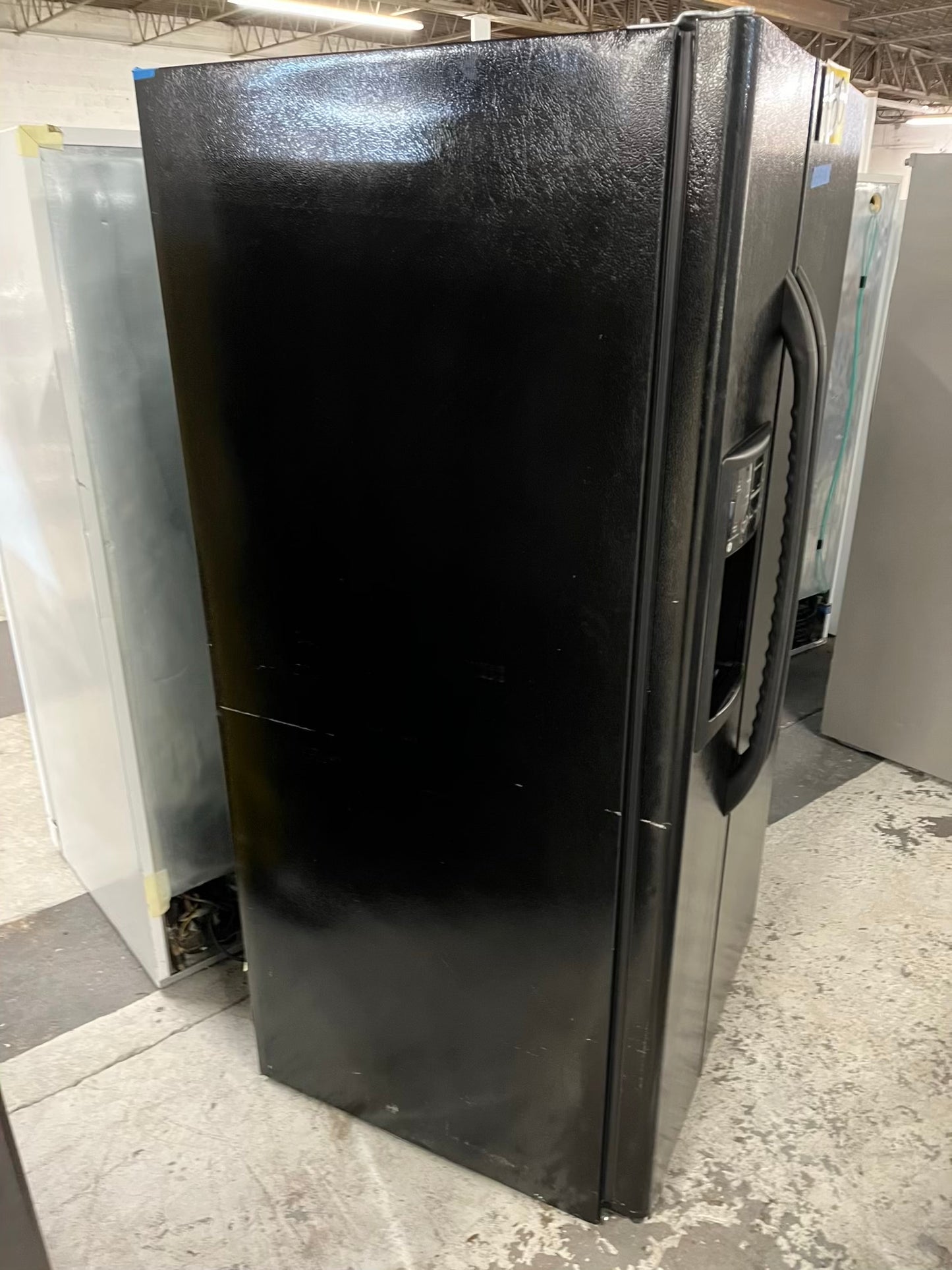 GE side x side refrigerator black w/ice water dispenser 33” #RF393VB
