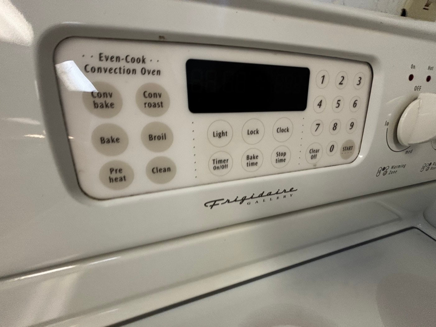 -Frigidaire Glass top electric 220v range 5 burner warm zone bake broil  convection bake  off white color 30" Refurbished #KOW11JL