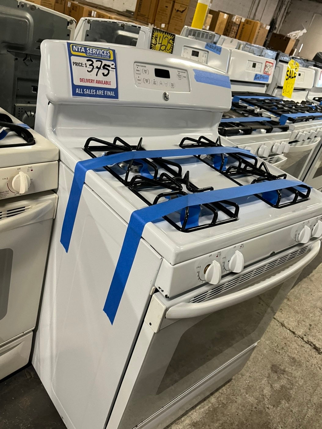 =GE Gas range 4 burner bake broil self clean in off white used-Refurbished 30” #GRE45B