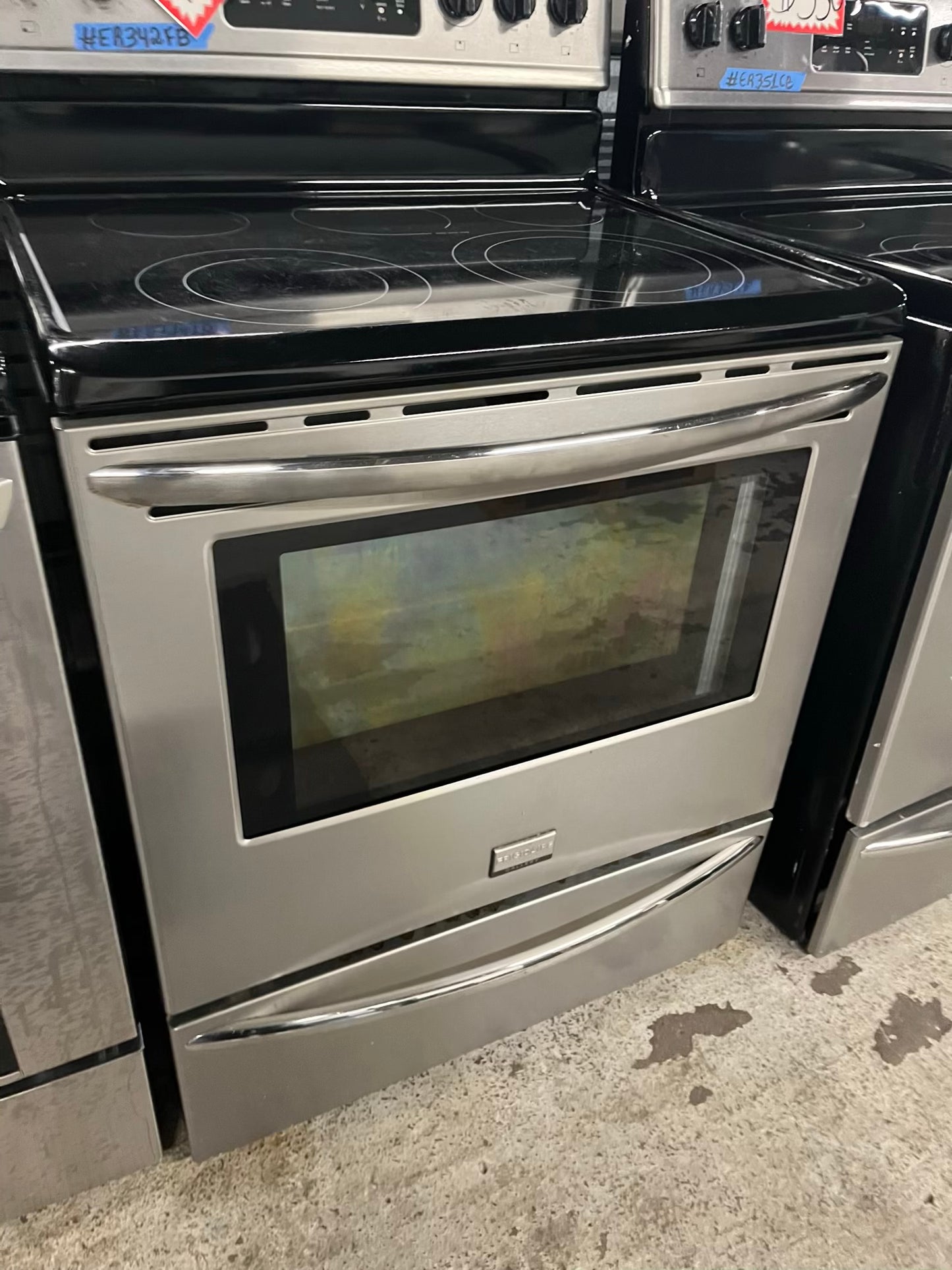 - Frigidaire electric range stainless steel 5 burner warm zone bake roast broil self clean 30” item number #ER342FB