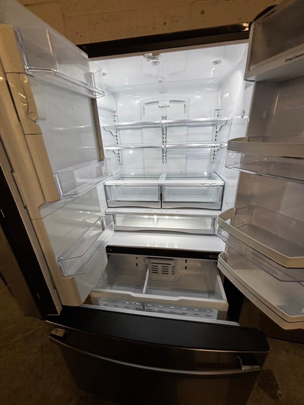 Used | Refurbished 22cu.ft -GE counter depth french door refrigerator stainless steel w/ice water dispenser 36" #RF6311b