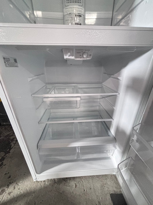 >GE white top freezer fridge ,used like new-refurbished 33" item number #RFL66YB