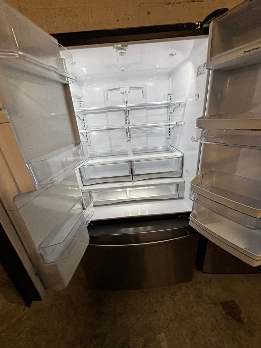Used | Refurbished 22cu.ft -GE counter depth french door refrigerator stainless steel w/ice water dispenser 36" #RF6311b