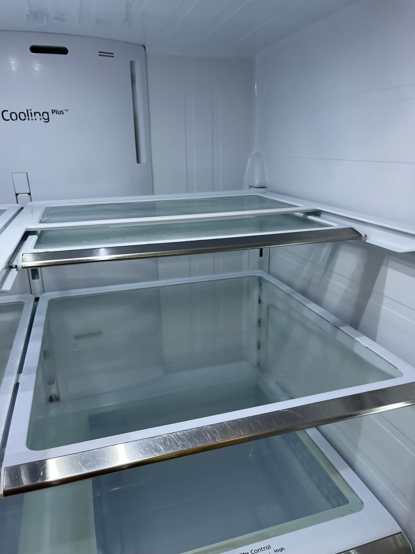 Used | Refurbished Samsung four door refrigerator stainless steel w/ice water dispenser 36" #RF502YL