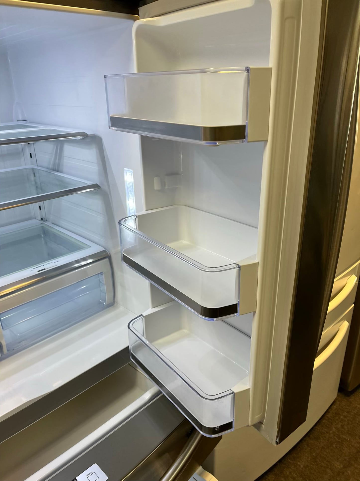Used | Refurbished Samsung four door refrigerator stainless steel w/ice water dispenser 36" #RF502YL