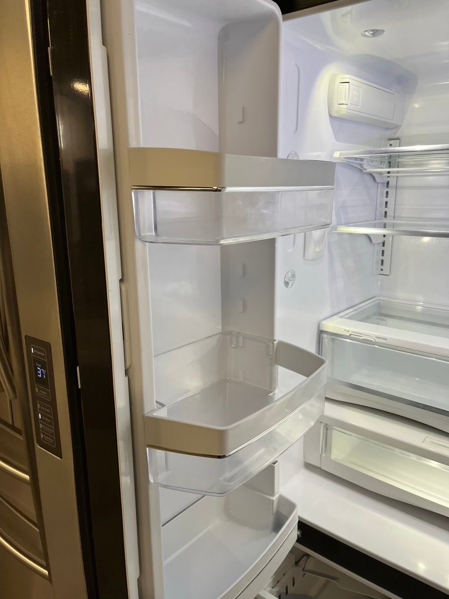 GE French door Refrigerator counter depth stainless steel w/water dispenser  & ice maker inside Item number #RF734VB 36” in Refurbished