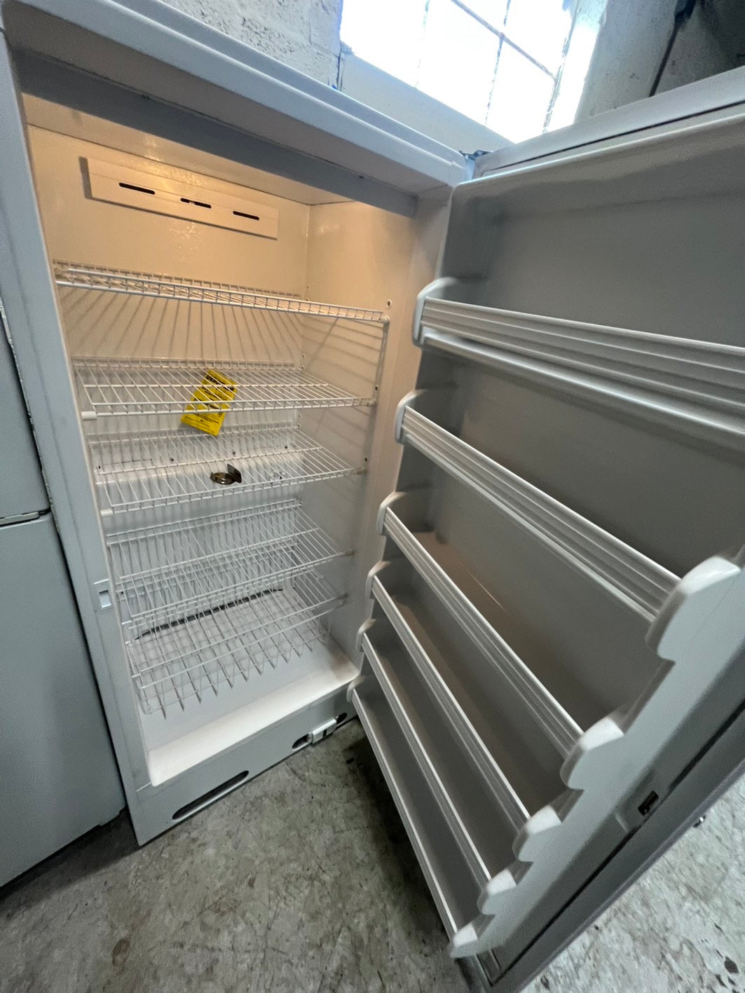 Ge 20 cu.ft up-right freezer white 32" #RF9001B-TR Refurbished