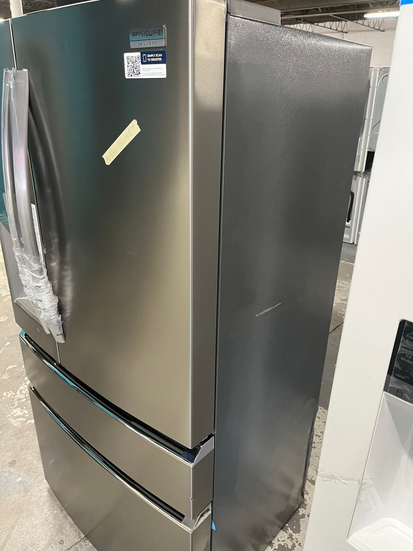 - Frigidaire Gallery four door refrigerator counter depth  stainless steel w/ice and water dispenser  used-refurbished 36”  #RF994BPB