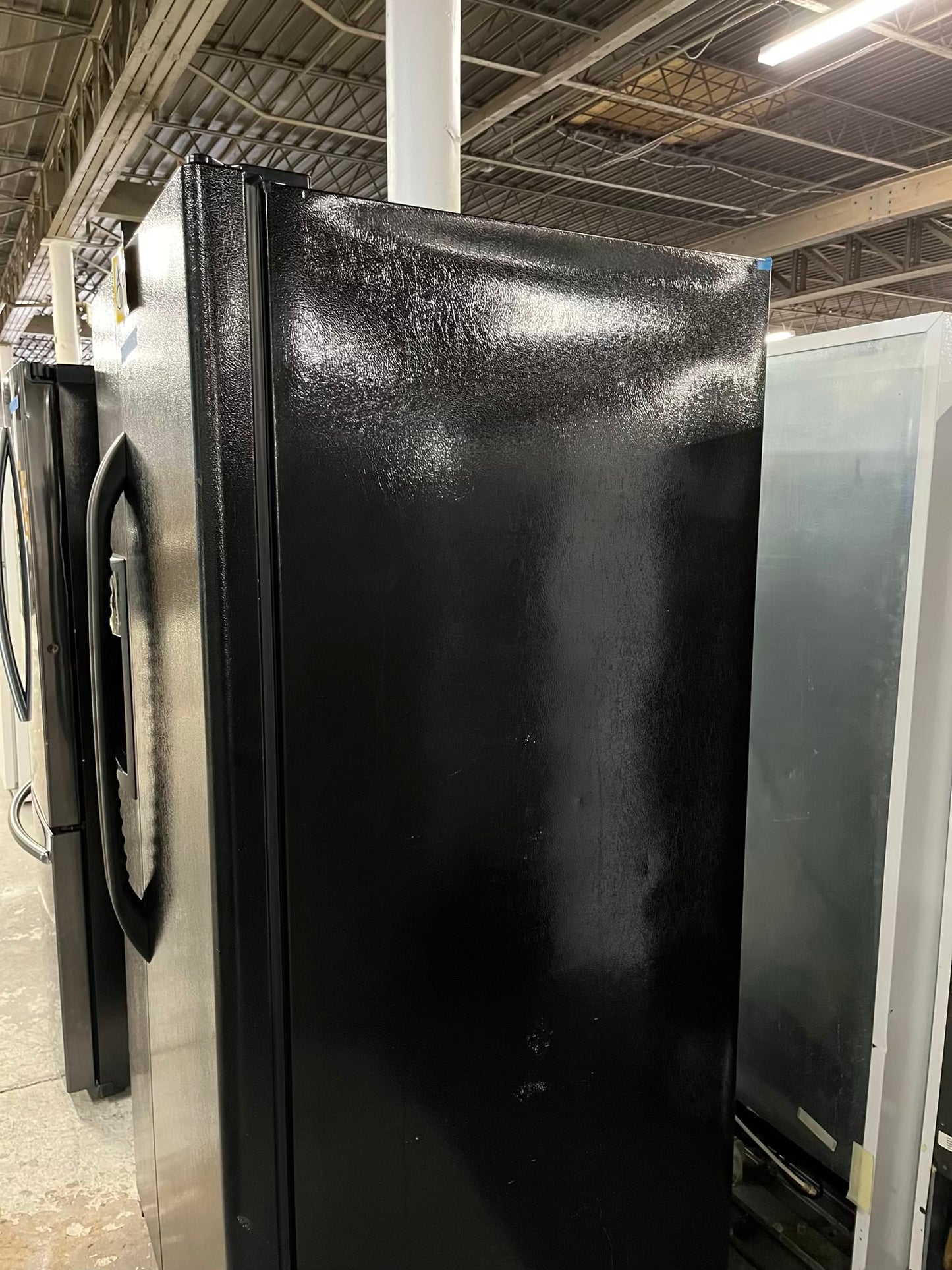 GE side x side refrigerator black w/ice water dispenser 33” #RF393VB