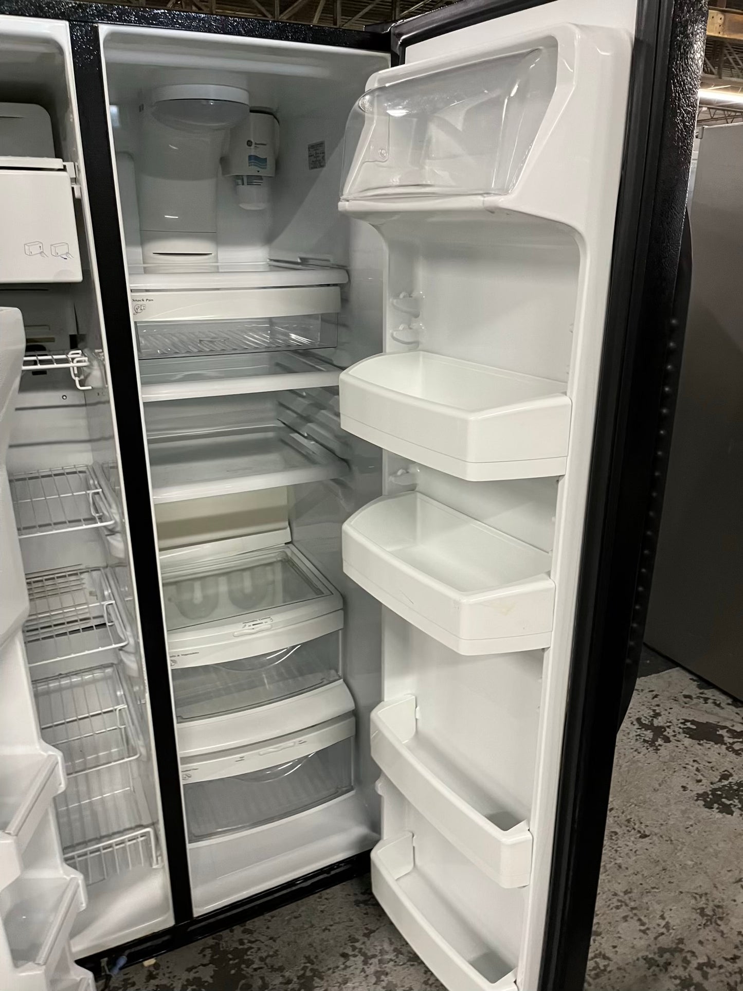 GE side x side refrigerator black w/ice water dispenser 33” #RF393VB