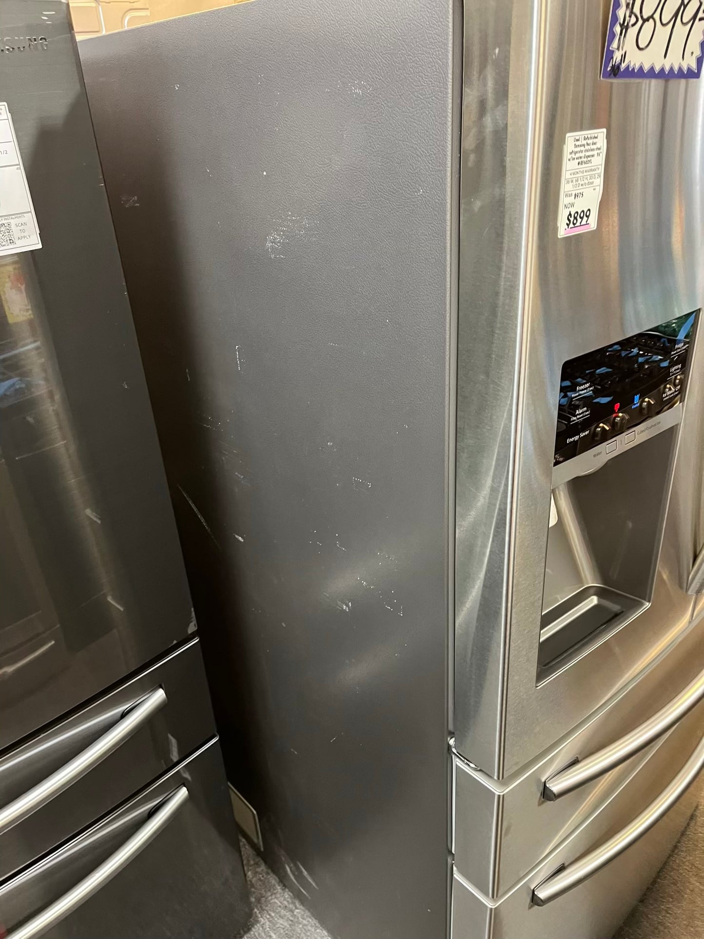 Used | Refurbished Samsung four door refrigerator stainless steel w/ice water dispenser 36" #RF502YL