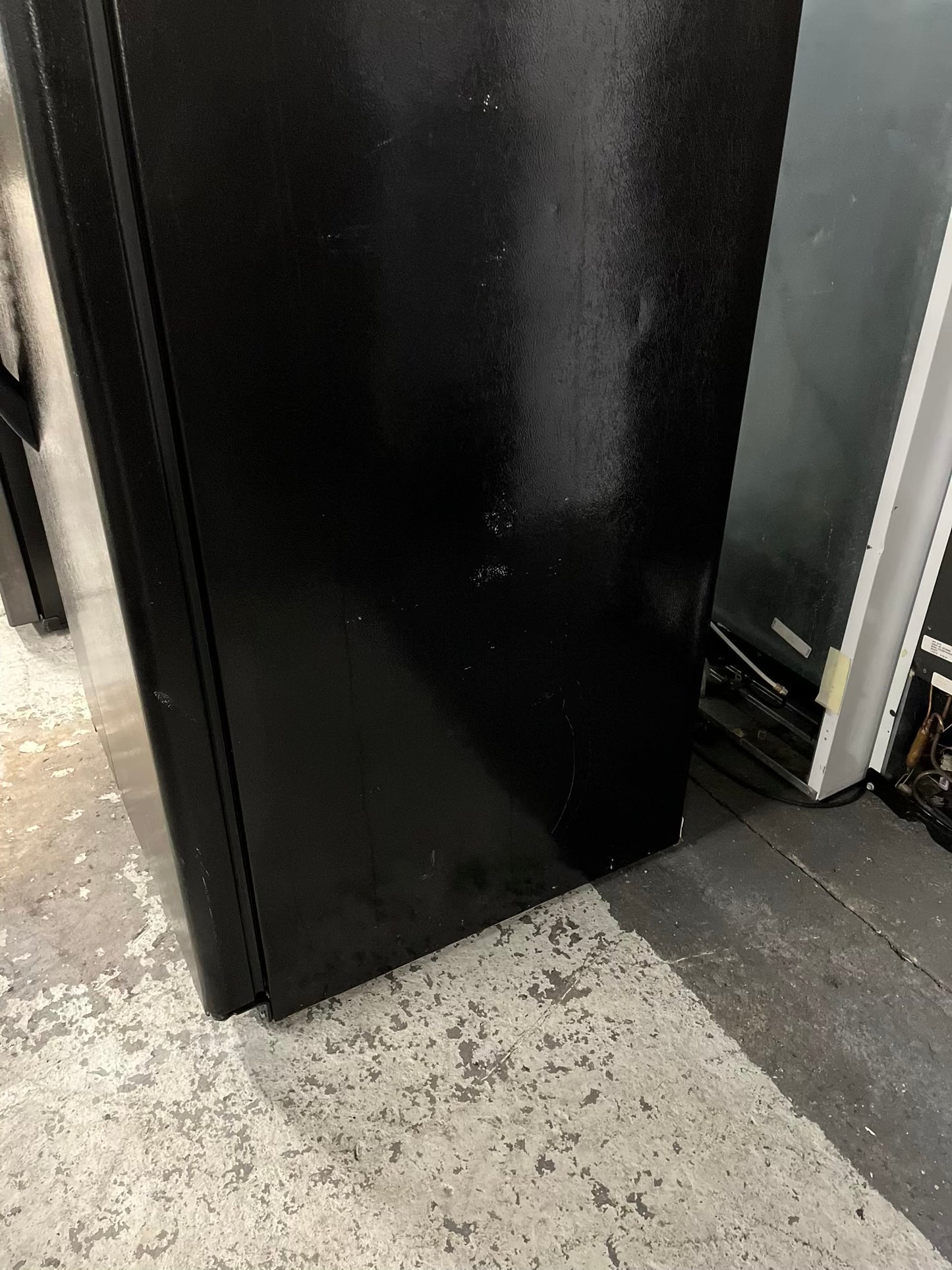 GE side x side refrigerator black w/ice water dispenser 33” #RF393VB