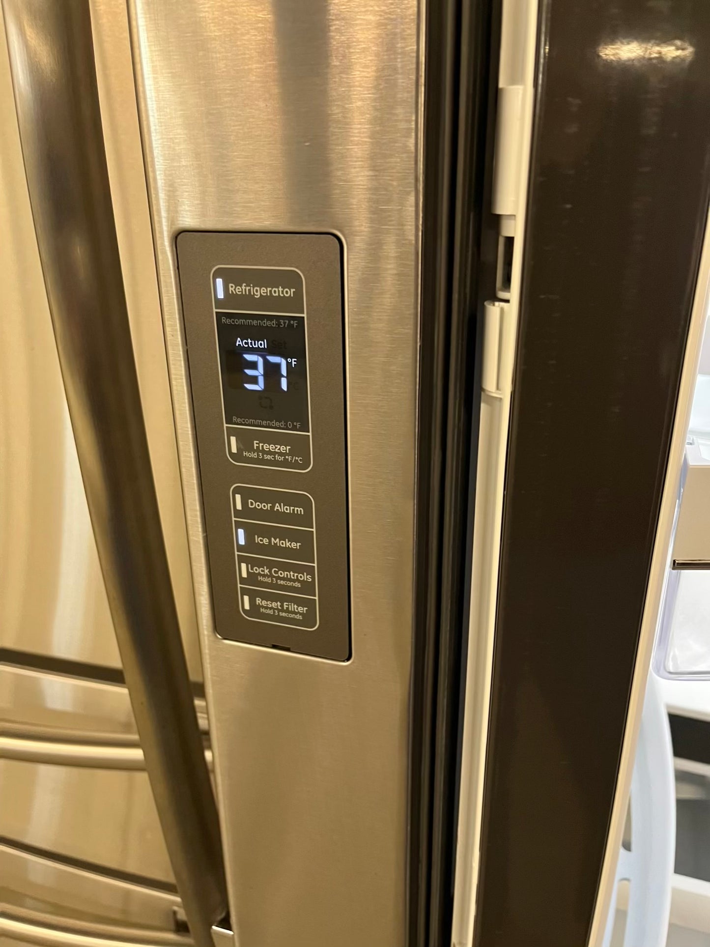 GE French door Refrigerator counter depth stainless steel w/water dispenser  & ice maker inside Item number #RF734VB 36” in Refurbished