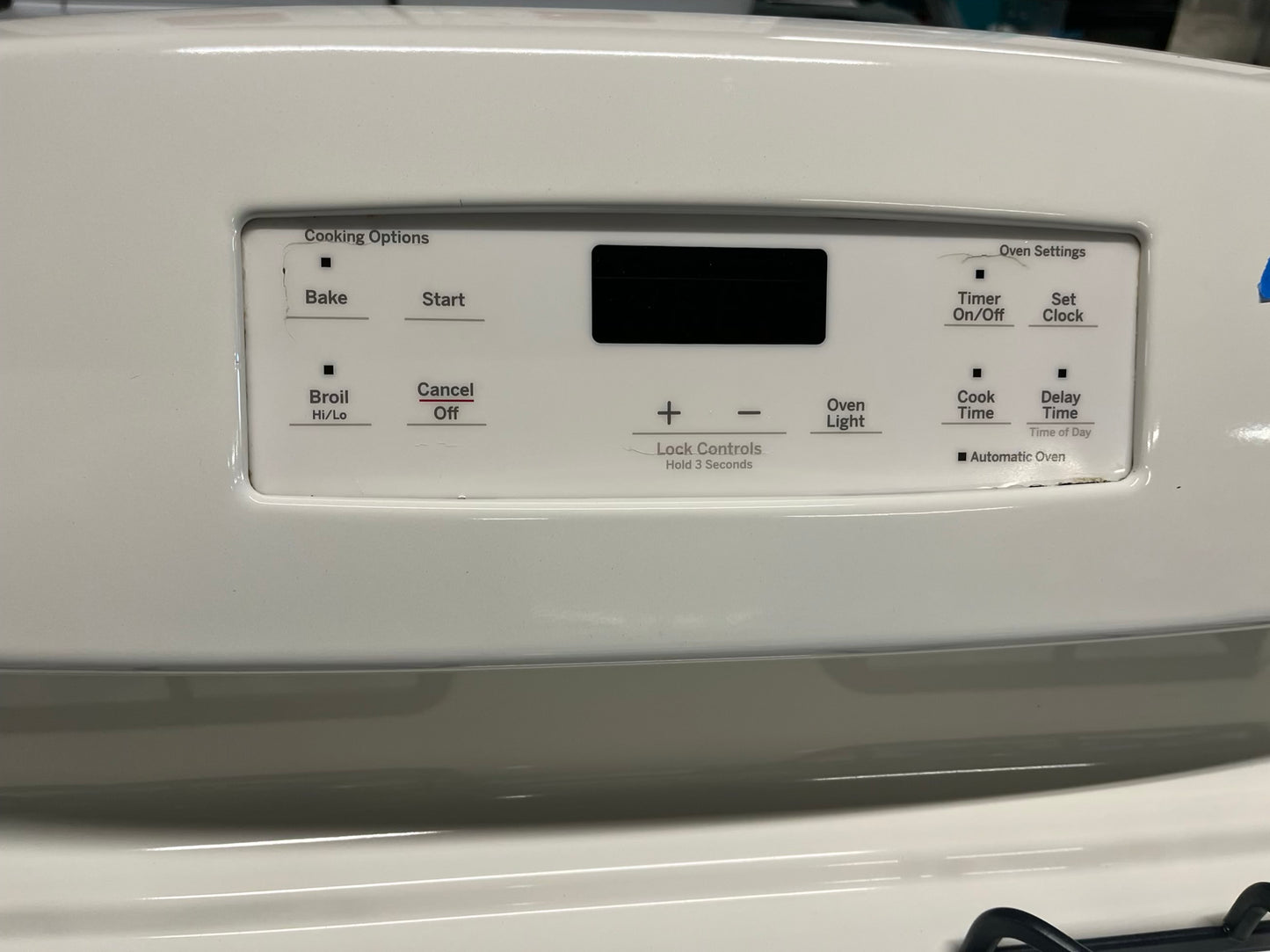 - GE Gas range 4 burner bake broil hi/lo in off white Refurbished 30" #GR235WB