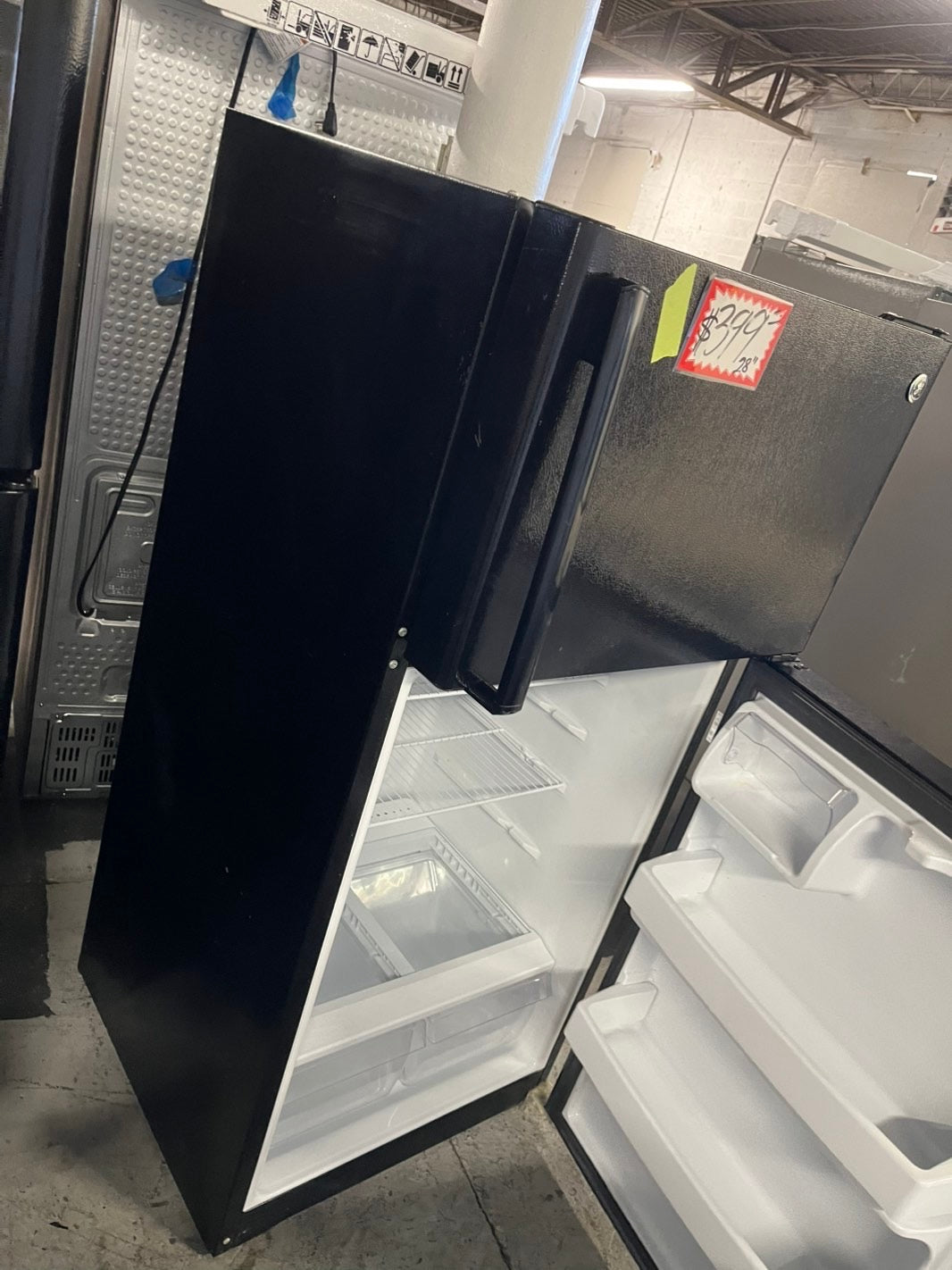 =GE 28” 16.6 cu.ft top freezer refrigerator in black used refurbished #RFG29B
