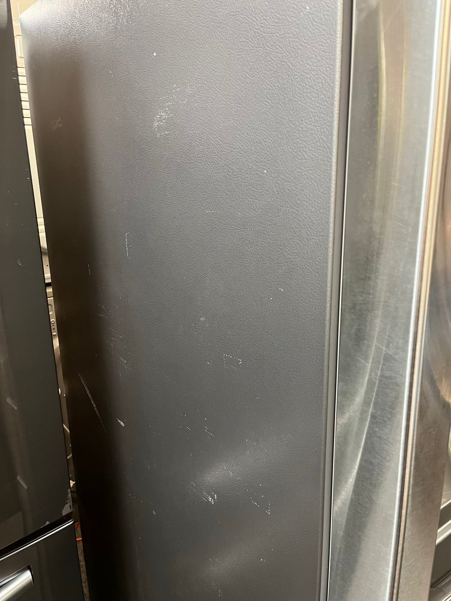 Used | Refurbished Samsung four door refrigerator stainless steel w/ice water dispenser 36" #RF502YL
