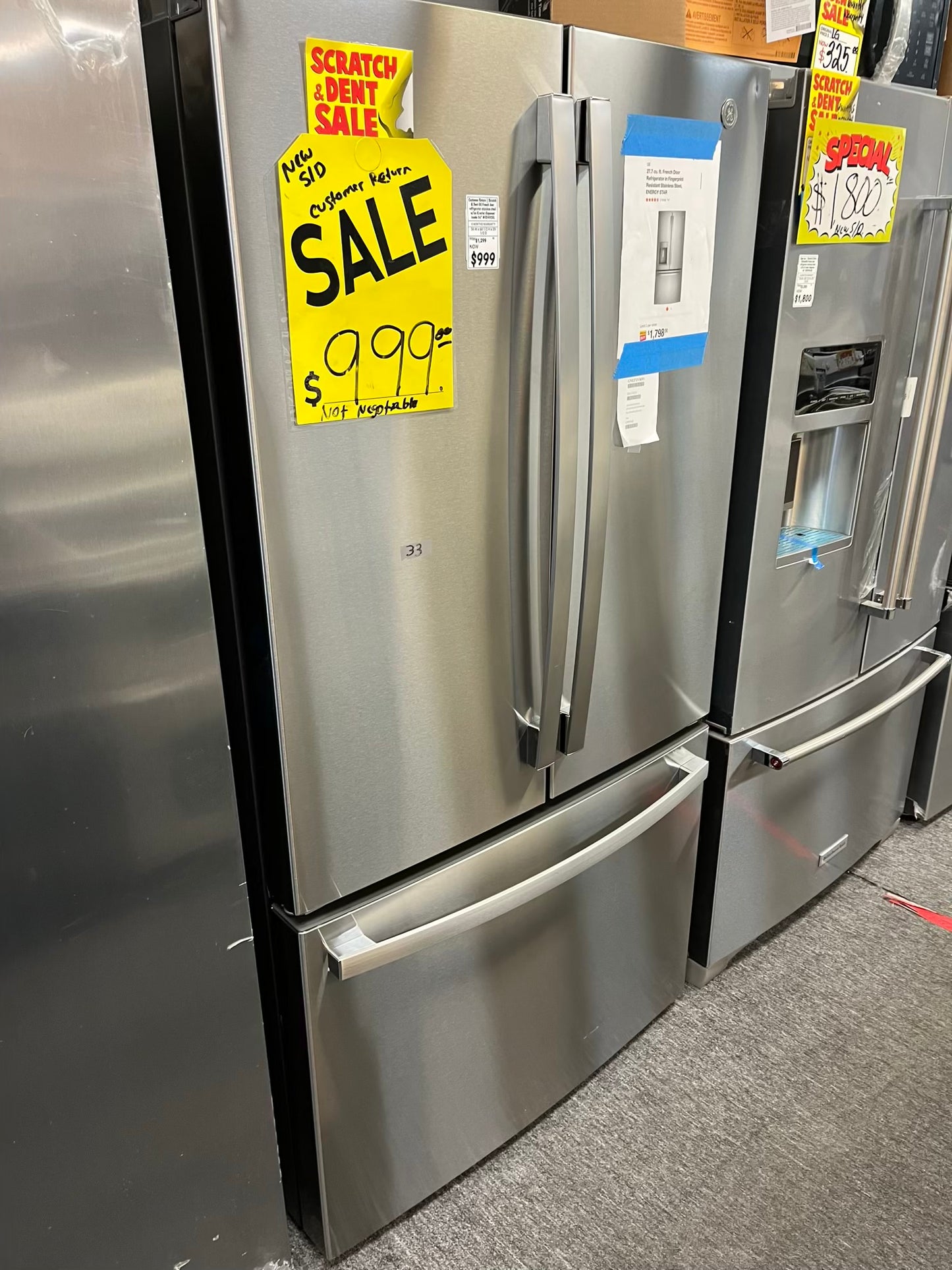 Customer Return | Scratch & Dent GE French door refrigerator stainless steel w/ice & water dispenser inside 36" #RF492GL